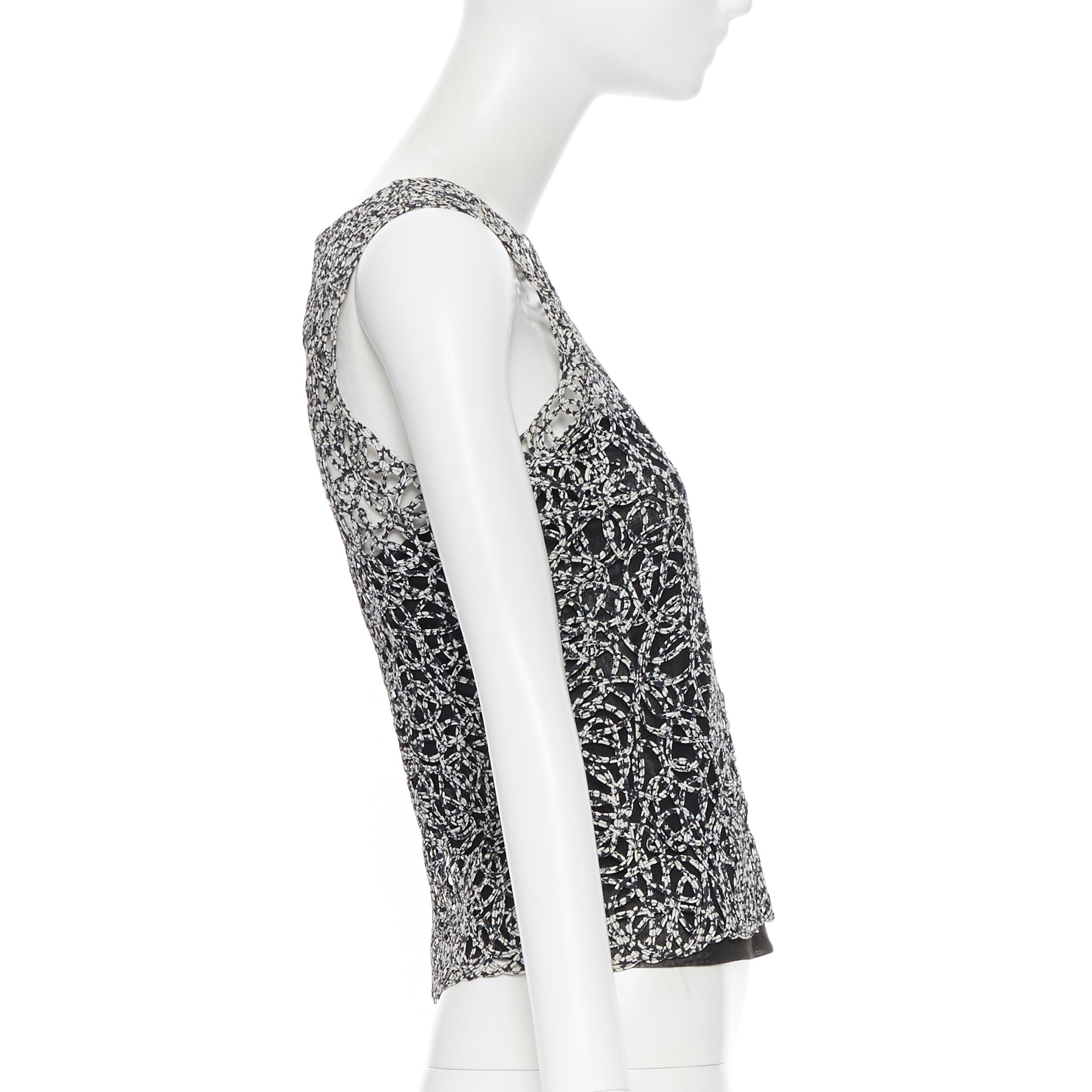 CHANEL 09P chaleco sin mangas con estampado abstracto blanco y negro FR36 1