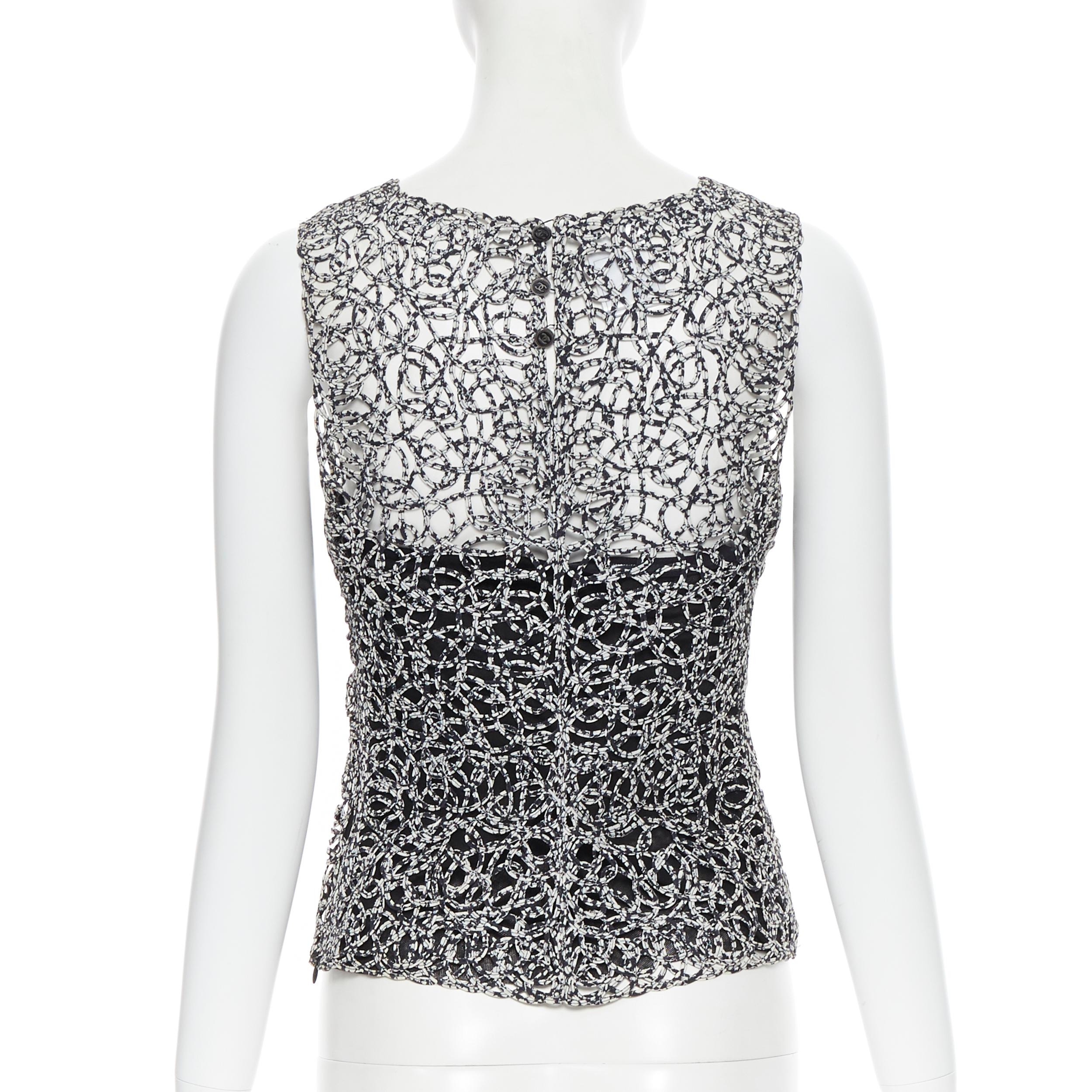 CHANEL 09P chaleco sin mangas con estampado abstracto blanco y negro FR36 2