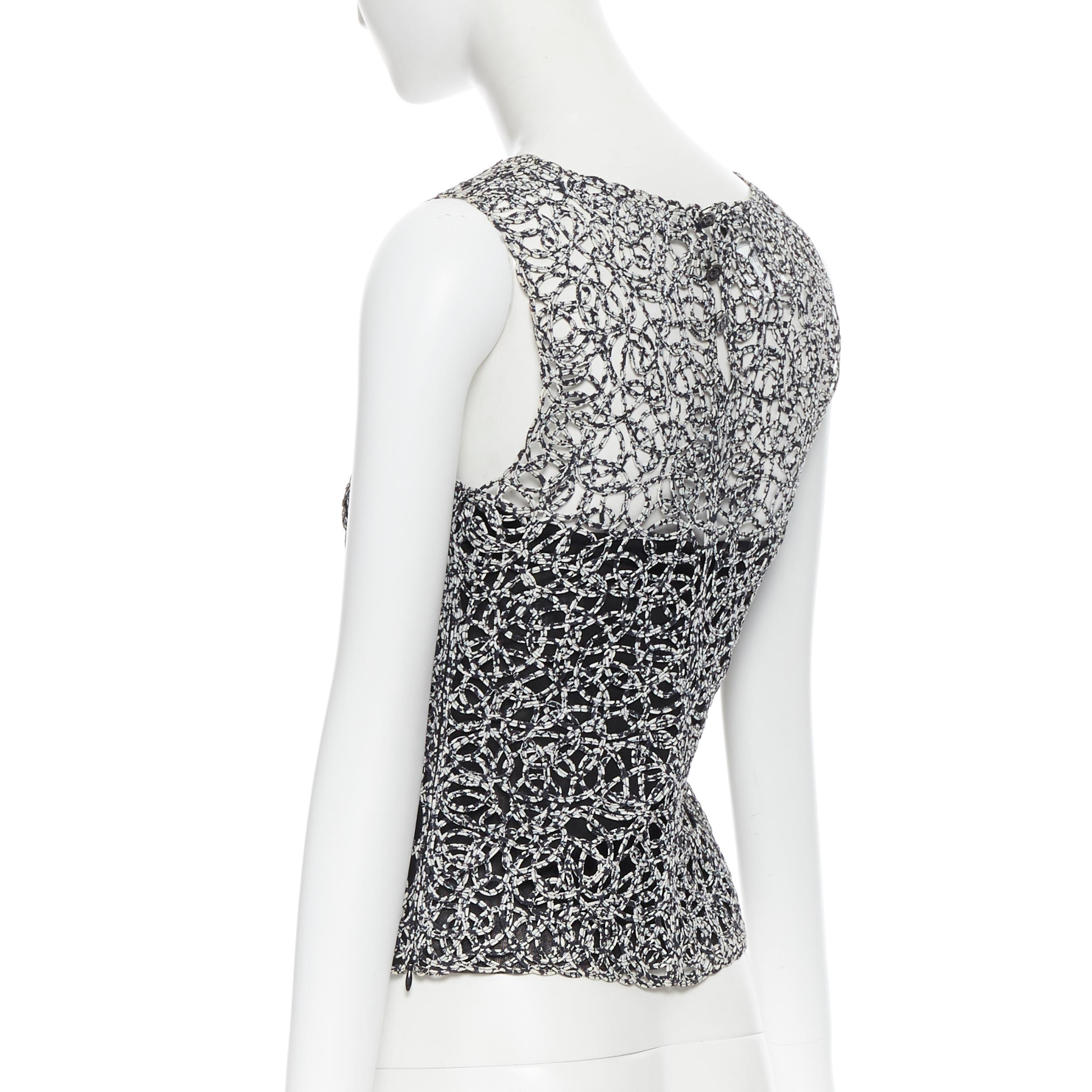CHANEL 09P chaleco sin mangas con estampado abstracto blanco y negro FR36 3