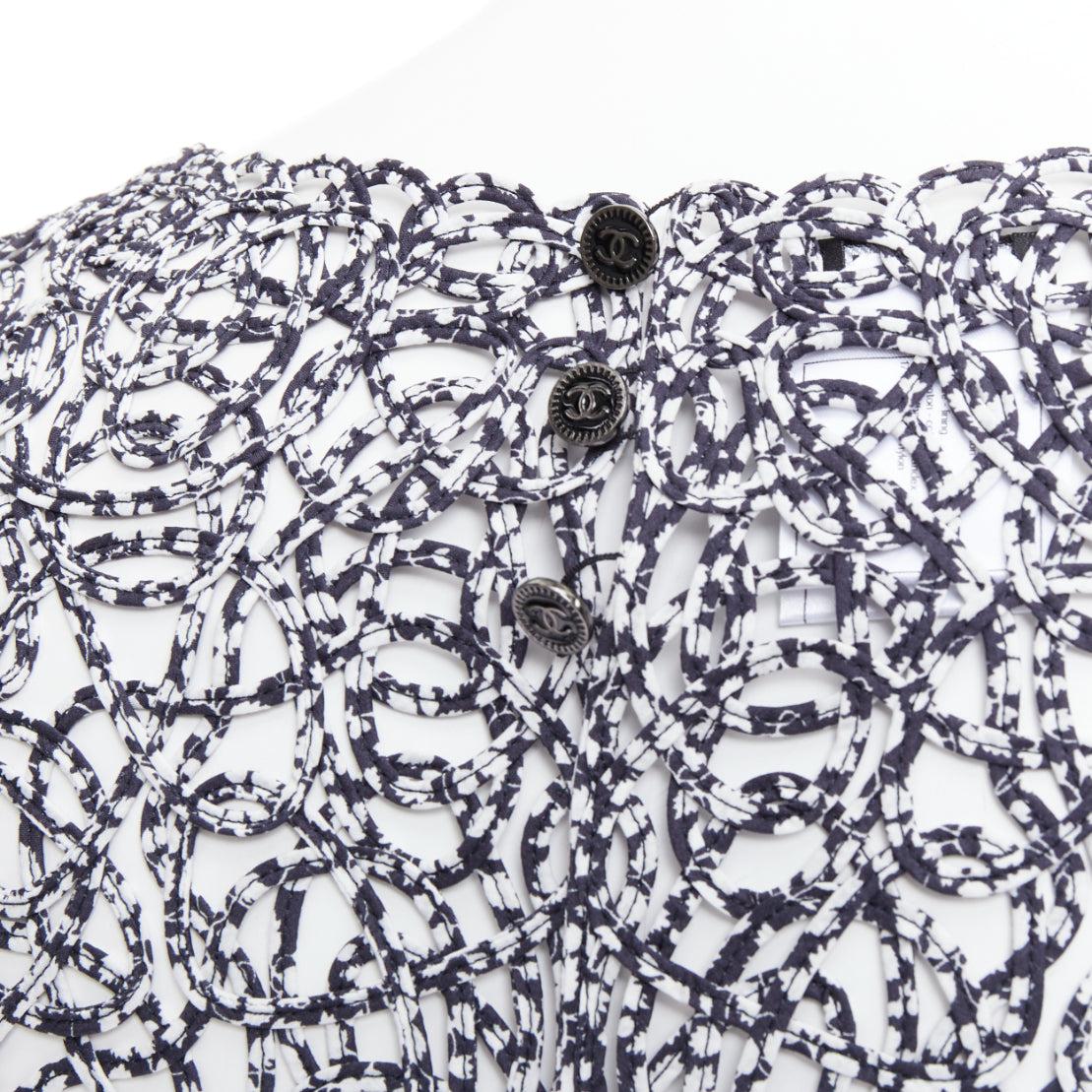 Chanel 09P nero bianco stampa astratta a ghirigori senza maniche FR40
Riferimento: TGAS/F00018
Marchio: Chanel
Designer: Karl Lagerfeld
Collezione: 09P
Materiale: Cotone
Colore: Nero, Bianco
Modello: Tinta unita
Chiusura: bottone
Fodera: Tessuto