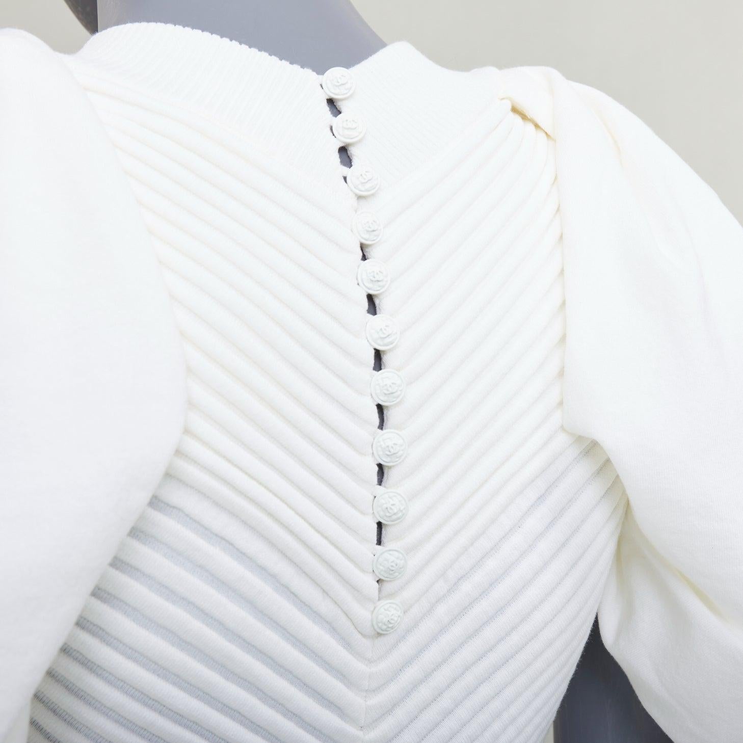 CHANEL 09P white cotton blend chevron puff sleeve CC buttons knit dress FR34 XS
Reference: SNKO/A00547
Brand: Chanel
Designer: Karl Lagerfeld
Collection: 09P
Material: Cotton, Blend
Color: Cream
Pattern: Solid
Closure: Button
Extra Details: CC
