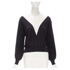 CHANEL Pull à breloques CC en laine 100 % noire et blanche avec col en maille métallique FR38 M