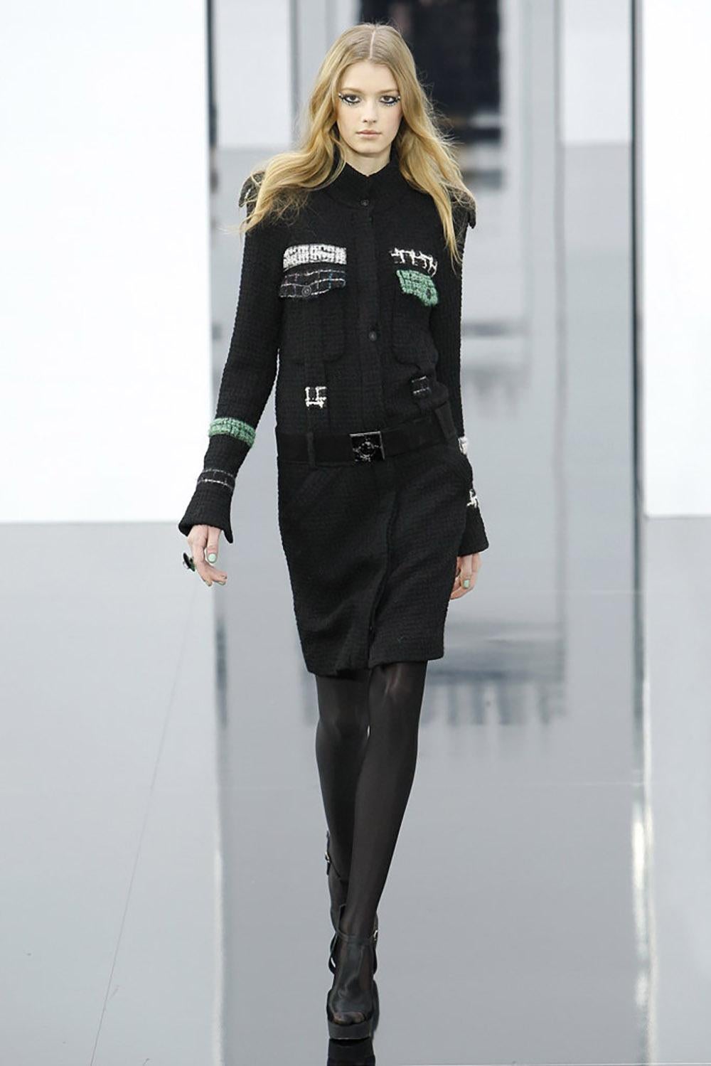 Absolutely gorgeous Chanel black tweed coat with Jewel Gripoix bett from 2009 Fall Collection -- as seen on Runway and in Ad Campaign!
- boutique price over 9,600$
Size mark 36 FR. Never worn.
- CC logo jewel buttons at pockets, cuffs and