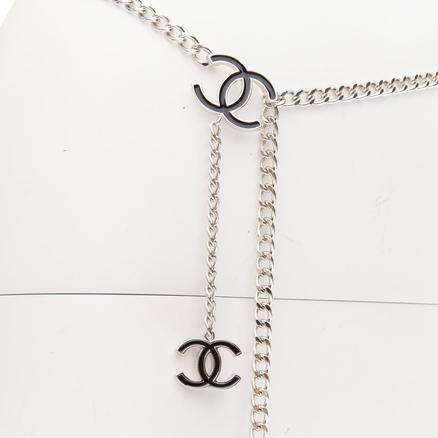 CHANEL 10V black CC silver chain 3 charms hanging chain waist belt
Reference: LNKO/A02377
Brand: Chanel
Designer: Karl Lagerfeld
Collection: 10V
Material: Metal
Color: Black, Silver
Pattern: Solid
Closure: Hook & Bar
Lining: Silver Metal
Made in: