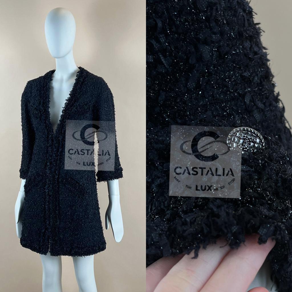 New fabulous Chanel black tweed jacket / coat made of precious Lesage tweed
~ from Paris / DUBAI 2015 Cruise Collection by Mr Karl Lagerfeld
~ Boutique price over 9,000$
Size mark 38 FR / Condition: never worn
- CC logo jewel charm at sleeve
- front