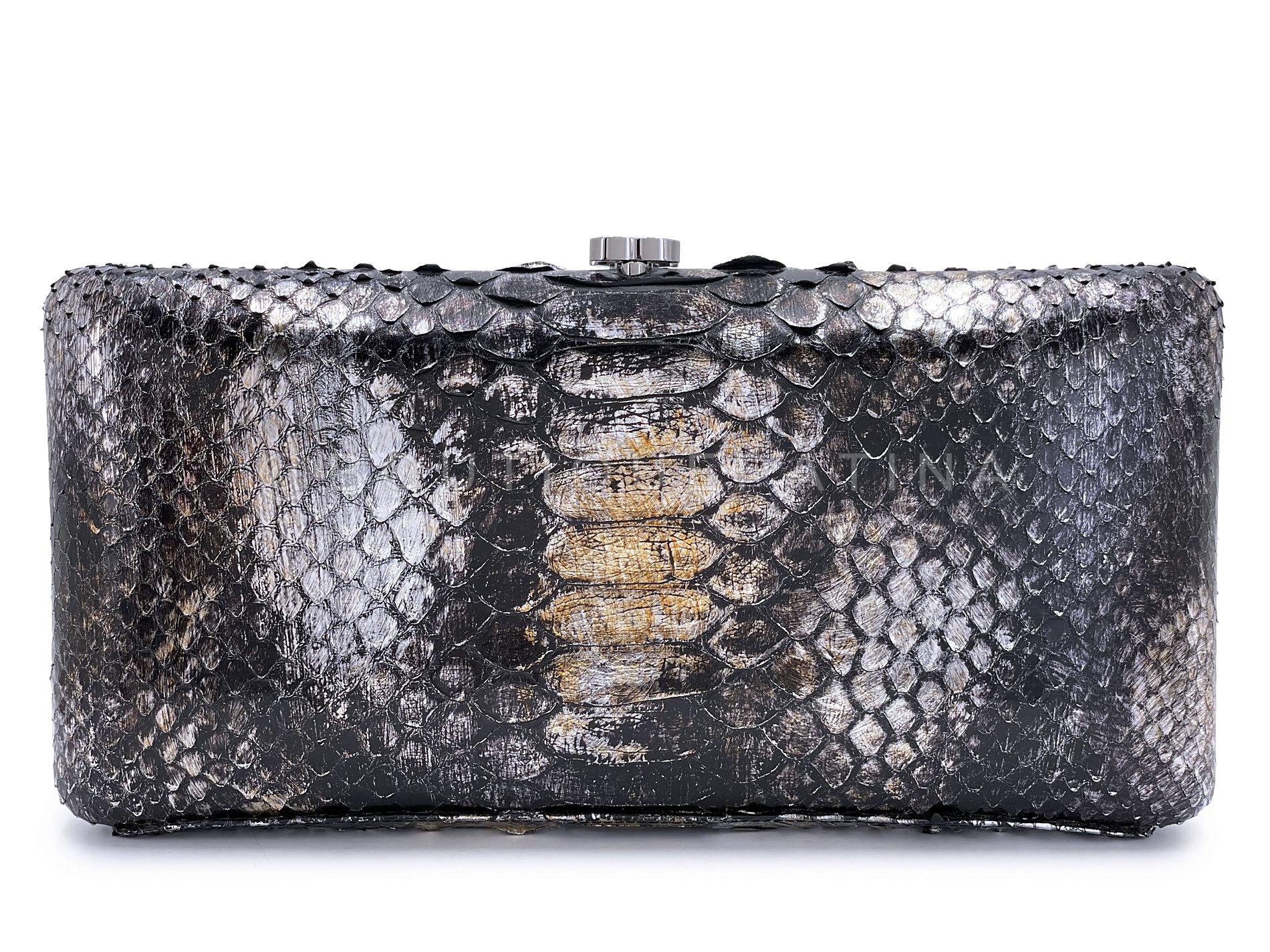Store item: 68467
Chanel 13A Paris-Edinburgh Dark Silver Ombre Python Clutch on Chain Evening Bag is the perfect versatile evening clutch - that can be discreetly worn in the hand or crossbody. 

Since 2019, Chanel has stopped using exotic skins
