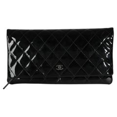 Chanel 14B Pochette di bellezza trapuntata nera con pattina CC