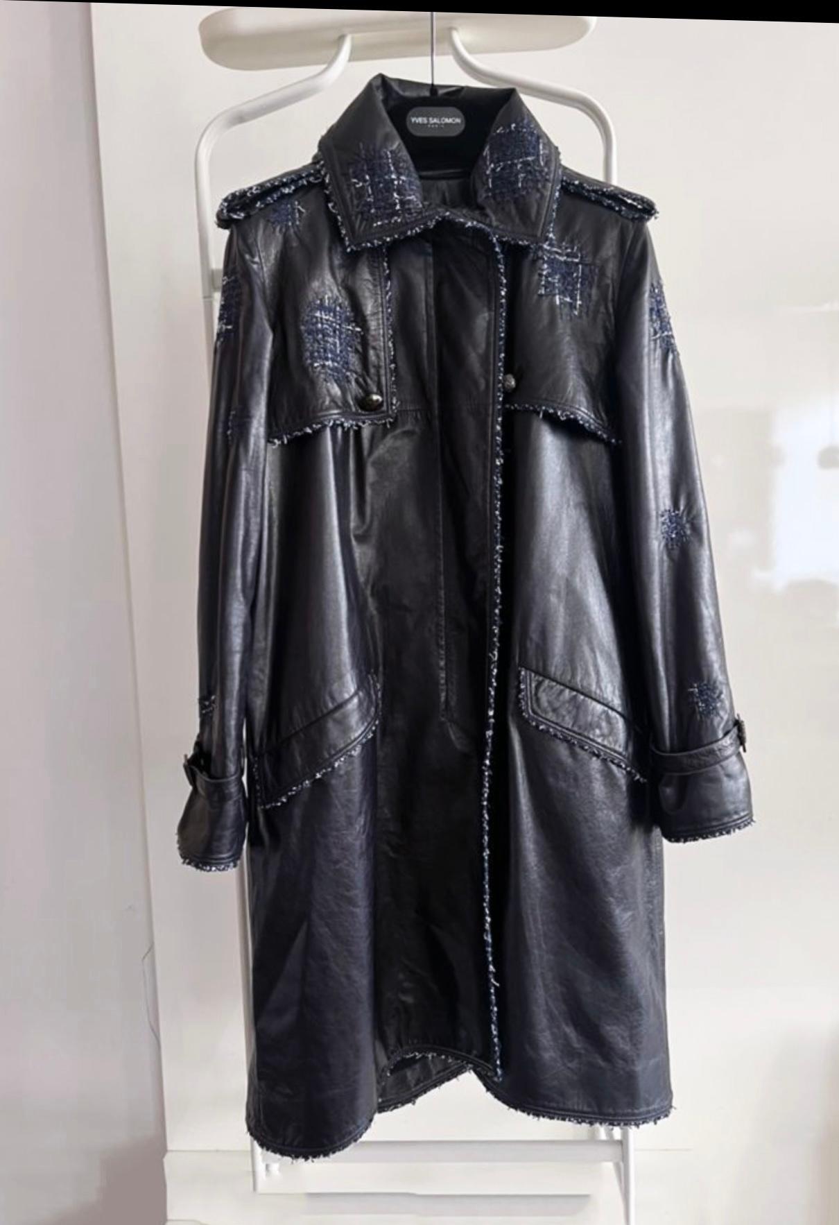 Luxurious Chanel navy leather trench coat with tweed accents!
Rarest find! Boutique price 13,860$
- CC logo buttons
- tonal silk lining
Size mark 38 FR. Condition is pristine, kept unworn