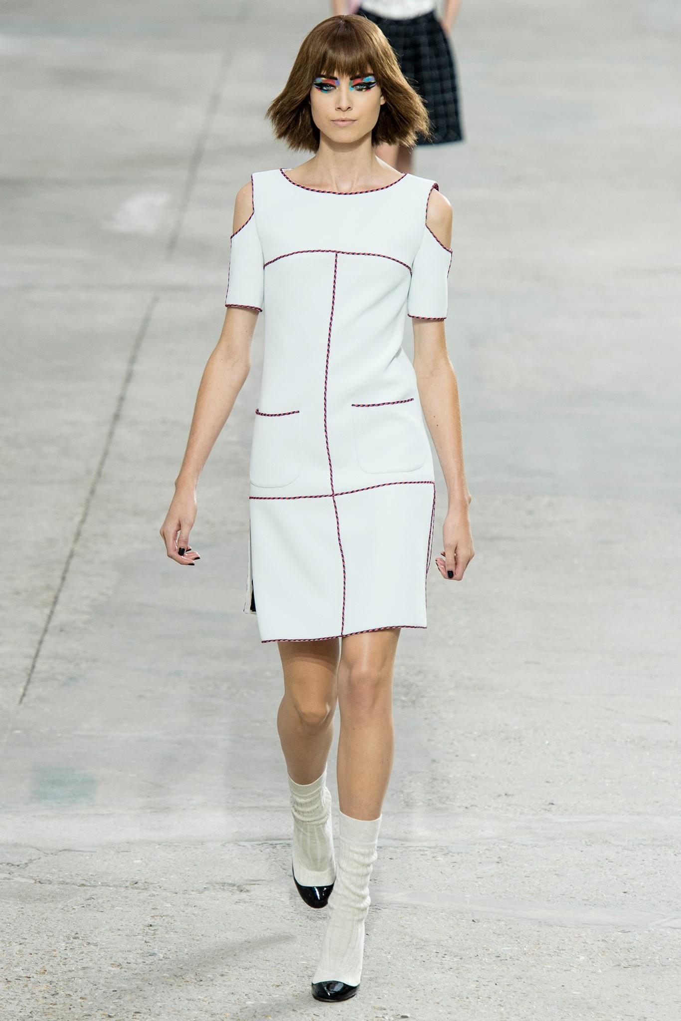Chanel 14P Light Grey Cold Shoulder Runway Dress.  From the Spring 2014 runway collection.  Cut-out shoulder design, very light dove grey color, trimmed with multicolor piping. Centre back zipper, straight cut body, front hip pockets. Size FR 38