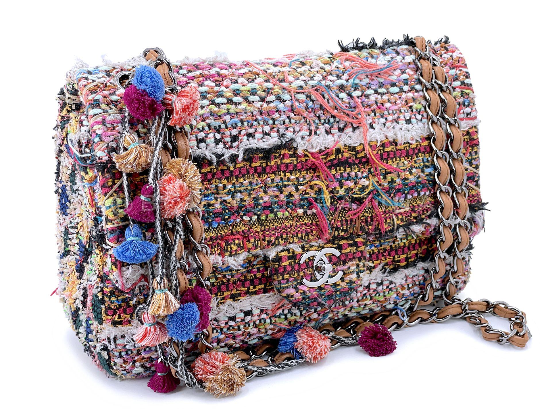 Store item: 68417
Chanel 15C Paris Dubai Pom Pom Tweed Jumbo Flap Bag RHW Rainbow

For 20 years, Boutique Patina has specialized in sourcing and curating the most pristine vintage and collectible accessories by searching closets around the world. 
A