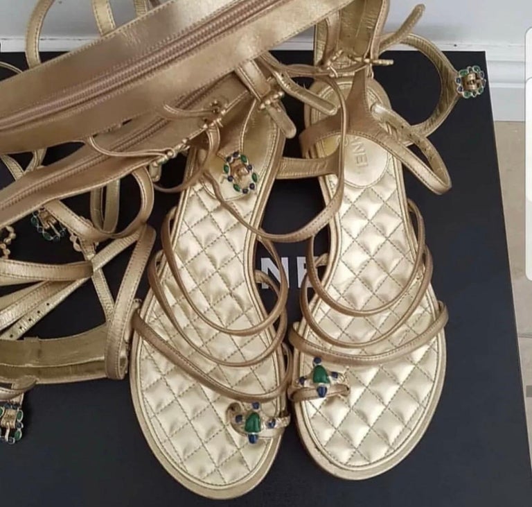 uformel Sygdom Wetland Chanel 15P 2015 Spring Gold Leather Gladiator Strap Sandals For Sale at  1stDibs | chanel gladiator sandals, gold wrap around sandals