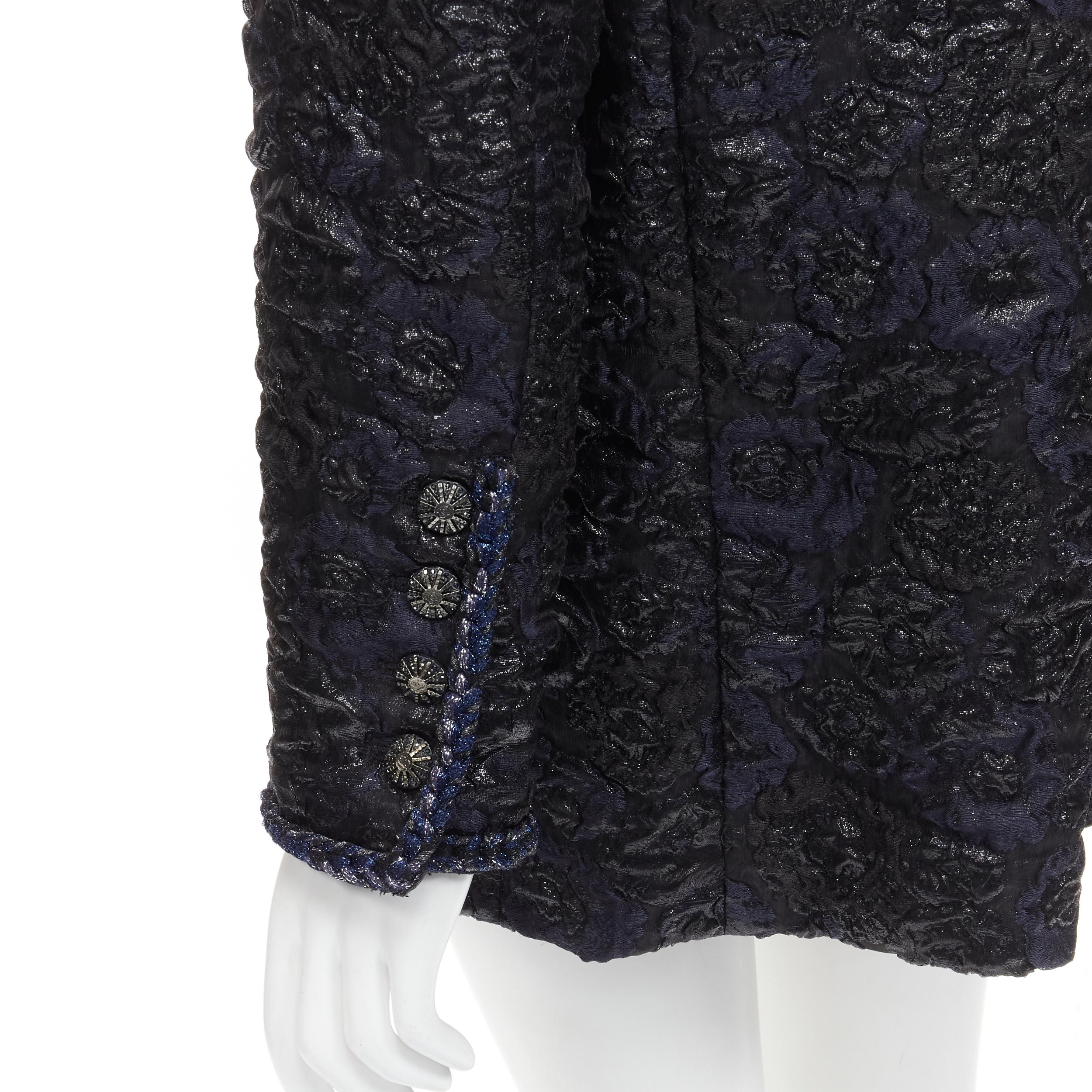 CHANEL 16B Act 1 black floral Camellia cloque crystal button jacket FR46 3XL
Brand: Chanel
Designer: Karl Lagerfeld
Collection: 16B Act 1 
Material: Acetate
Color: Black
Pattern: Solid
Closure: Zip
Extra Detail: Black metallic lurex floral cloque