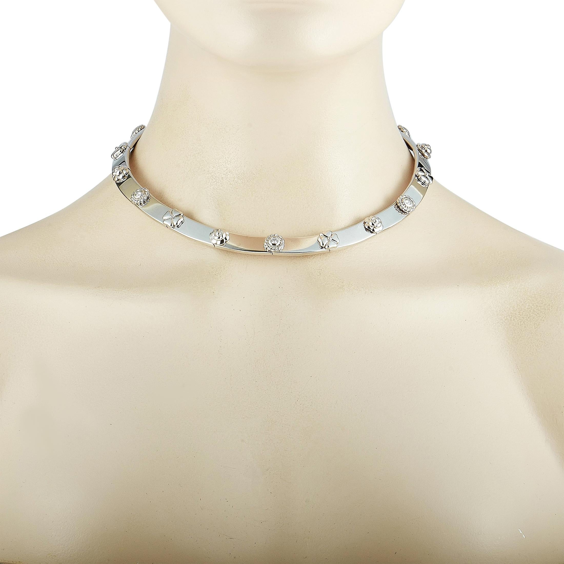 This Chanel necklace is crafted from 18K white gold and weighs 109.9 grams, measuring 15” in length. The necklace is embellished with diamonds that boast grade F color and VVS clarity and amount to 1.00 carat.

Offered in estate condition, this