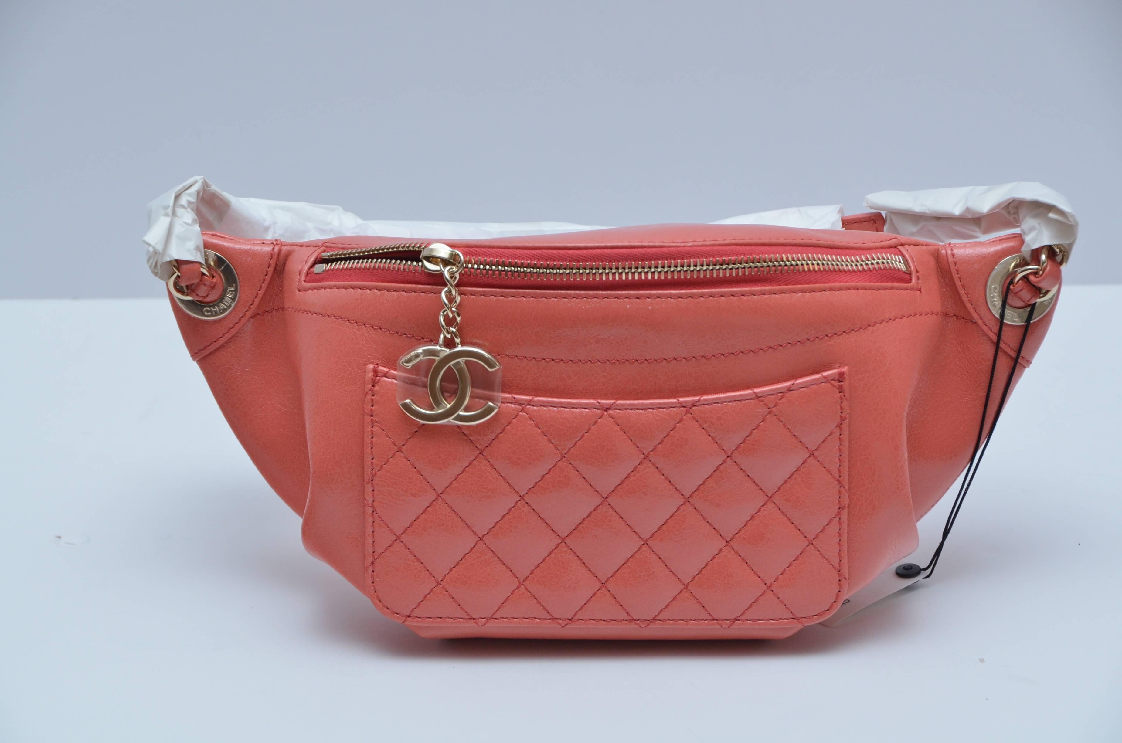 As Seen On Rita Ora 
Very Rare  Limited Edition 
Runway Collector's Item 
Nwt Nib Chanel 2018   
Glossy Pink  Calf Classic Belt Bag With Gold Tone Hardware
This bag has a zip and is extremely roomy
Approximate measurements: 5.5 X 13.4 X 2.8 CM

FULL