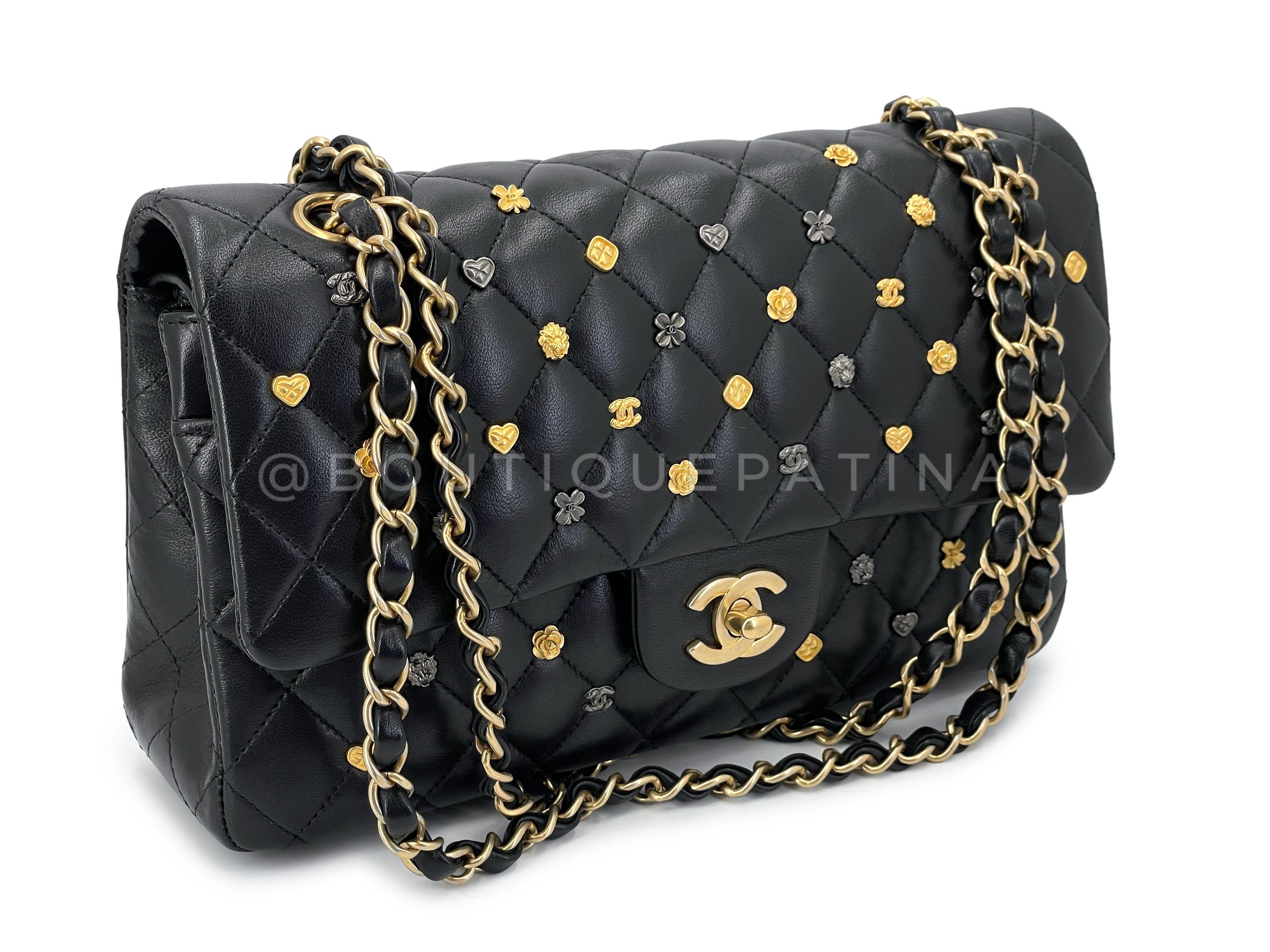 Store item: 67513
Chanel 18K Lucky Heart Charms Medium Classic Double Flap Bag Black is a very special release of the medium classic double flap, with hearts, clovers, camellias, and leo the lionhead charms embedded in the corners of the diamond