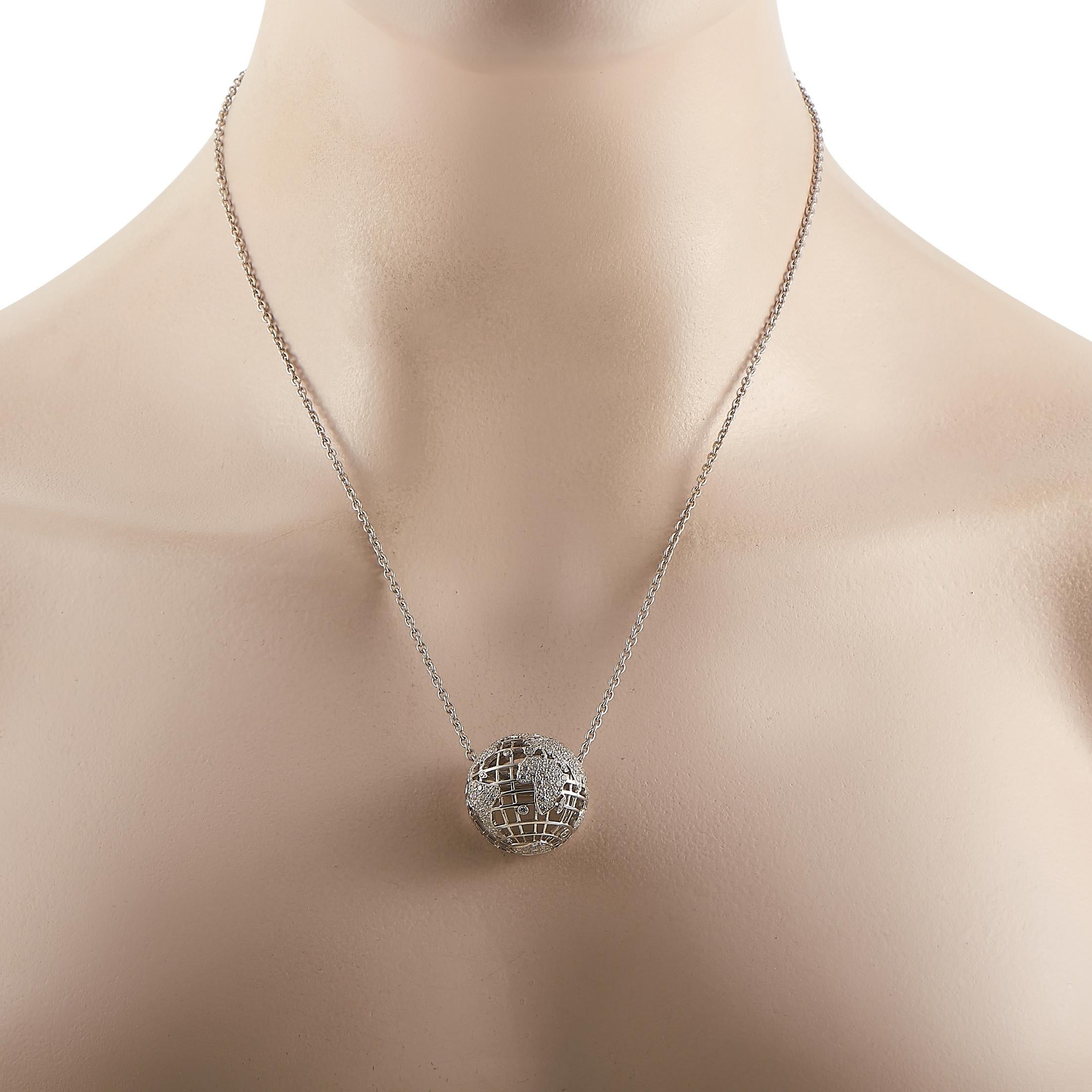 This whimsical necklace from Chanel will capture your imagination thanks to the dainty globe measuring .75” round suspended from a 17” chain. The charming 18K White Gold pendant also includes glittering inset round-cut diamonds with a total weight