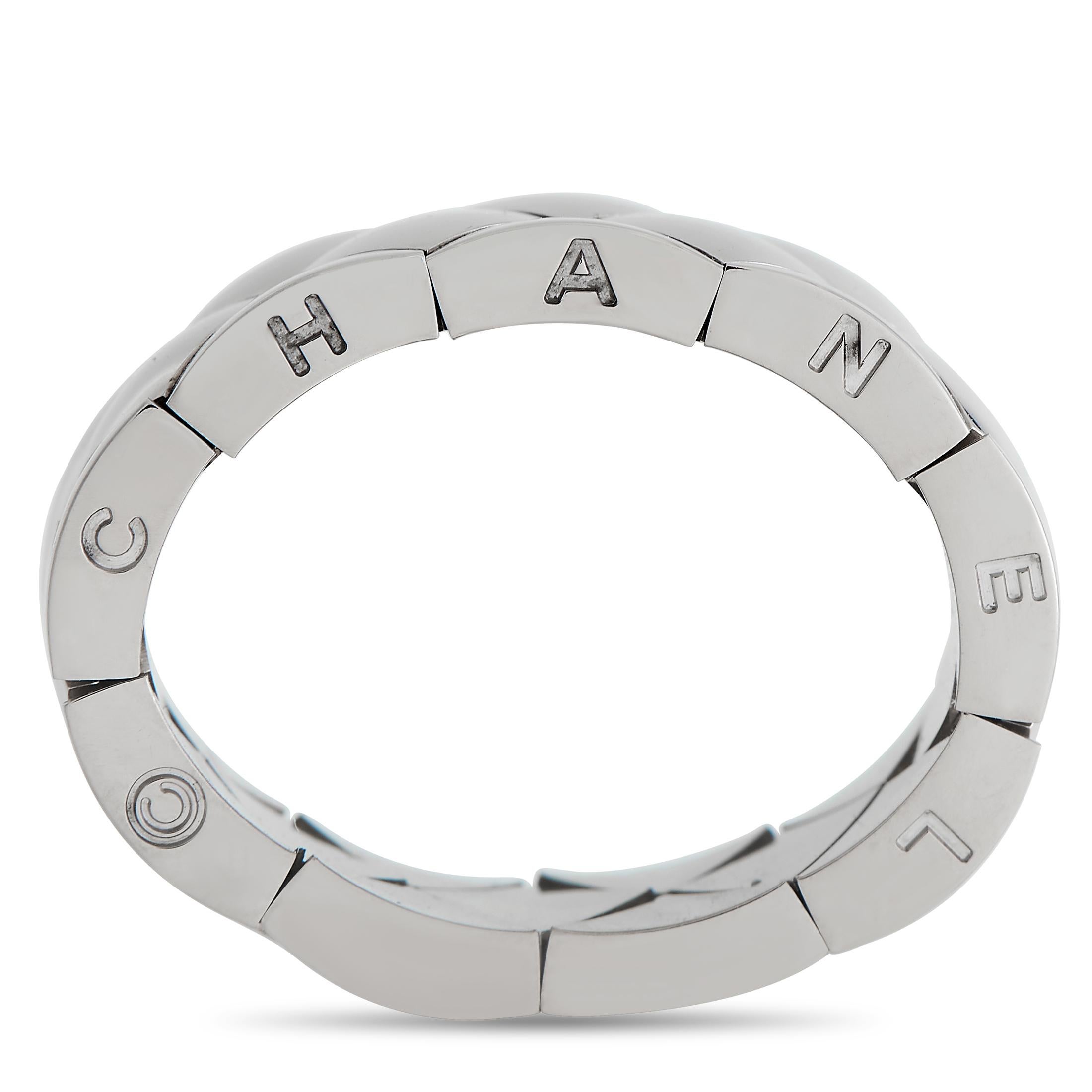 Simple, elegant, and decidedly chic, this Chanel band ring will add a touch of luxury to any ensemble it’s paired with. This piece measures 7mm wide and features the brand’s signature quilted texture around the perimeter. Crafted from 18K White