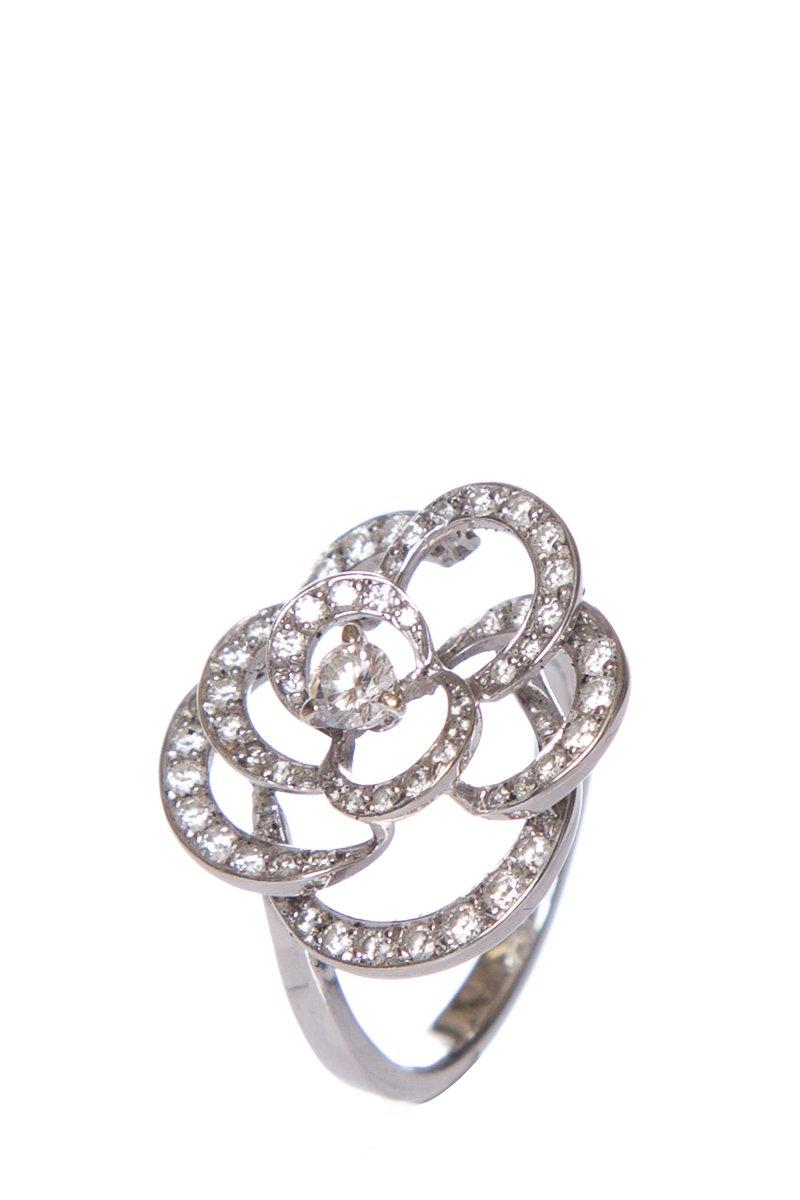 This Camelia ring from Chanel is made of 18K white gold and features sparkling Pave white diamonds. The ring features 63 brilliant-cut diamonds and 1 round-cut diamond. The total diamond carat weight is .78. Retail $13,400.