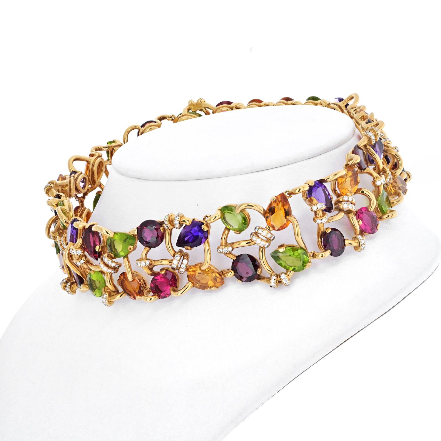 Stunning multicolor gemstone necklace crafted in 18K yellow gold by Chanel. Fits like a collar around your neck making a glamorous statement. Show off your beautiful neck, your fierce sense of style and a winning spirit when you put this important