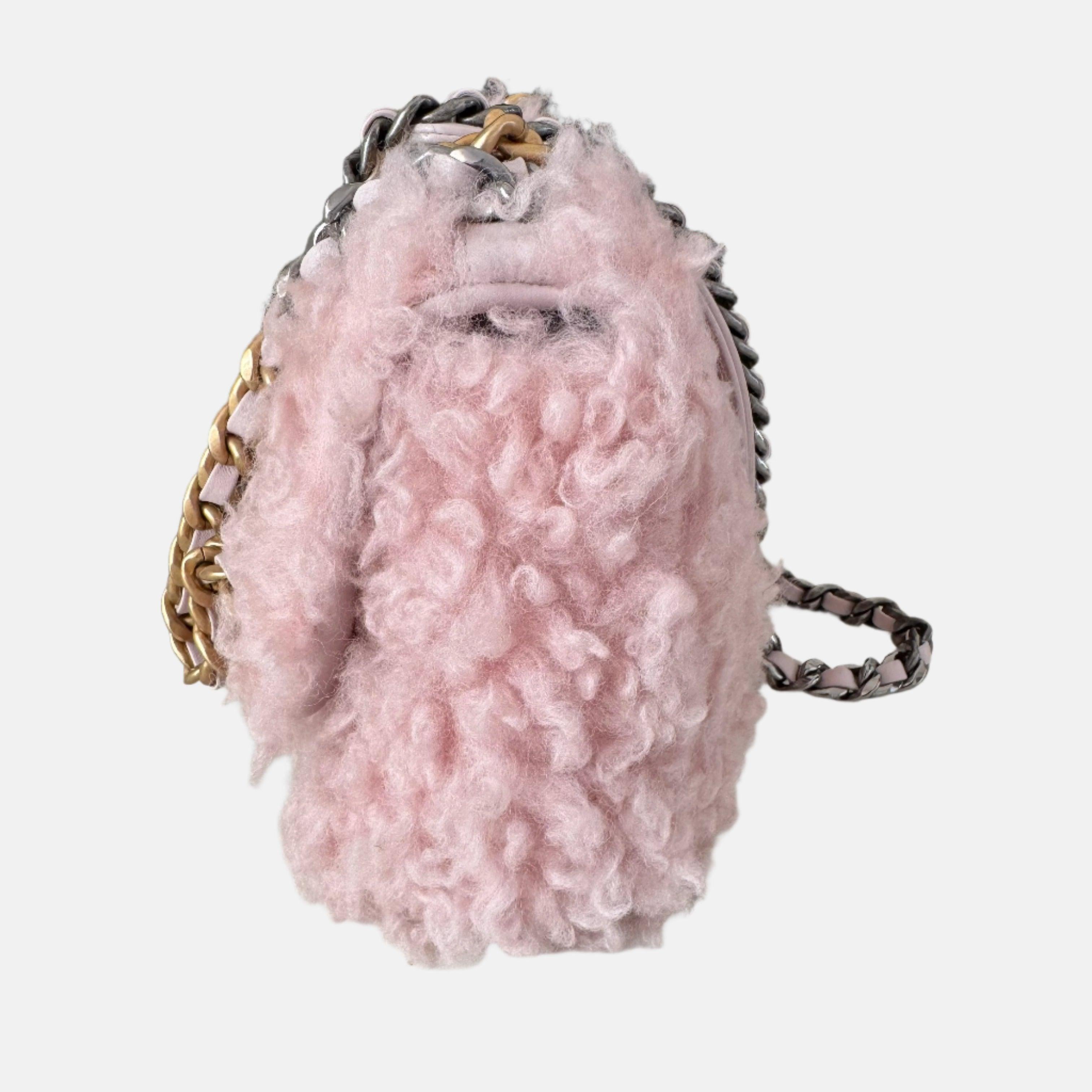 Chanel 19 Bag 2021 Small Pink Shearling Flap Bag
 These are professional photos of the actual bag.
 This 2021 Chanel 19 small pink shearling flap bag is your cutest winter accessory. Expertly crafted in Italy, featuring an interwoven CC-lock that