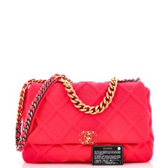 Sac à rabat en jersey matelassé Maxi Chanel 19