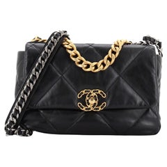 Sac à rabat Chanel 19 en cuir matelassé de taille moyenne