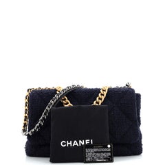 Sac à rabat en tweed matelassé Maxi Chanel 19