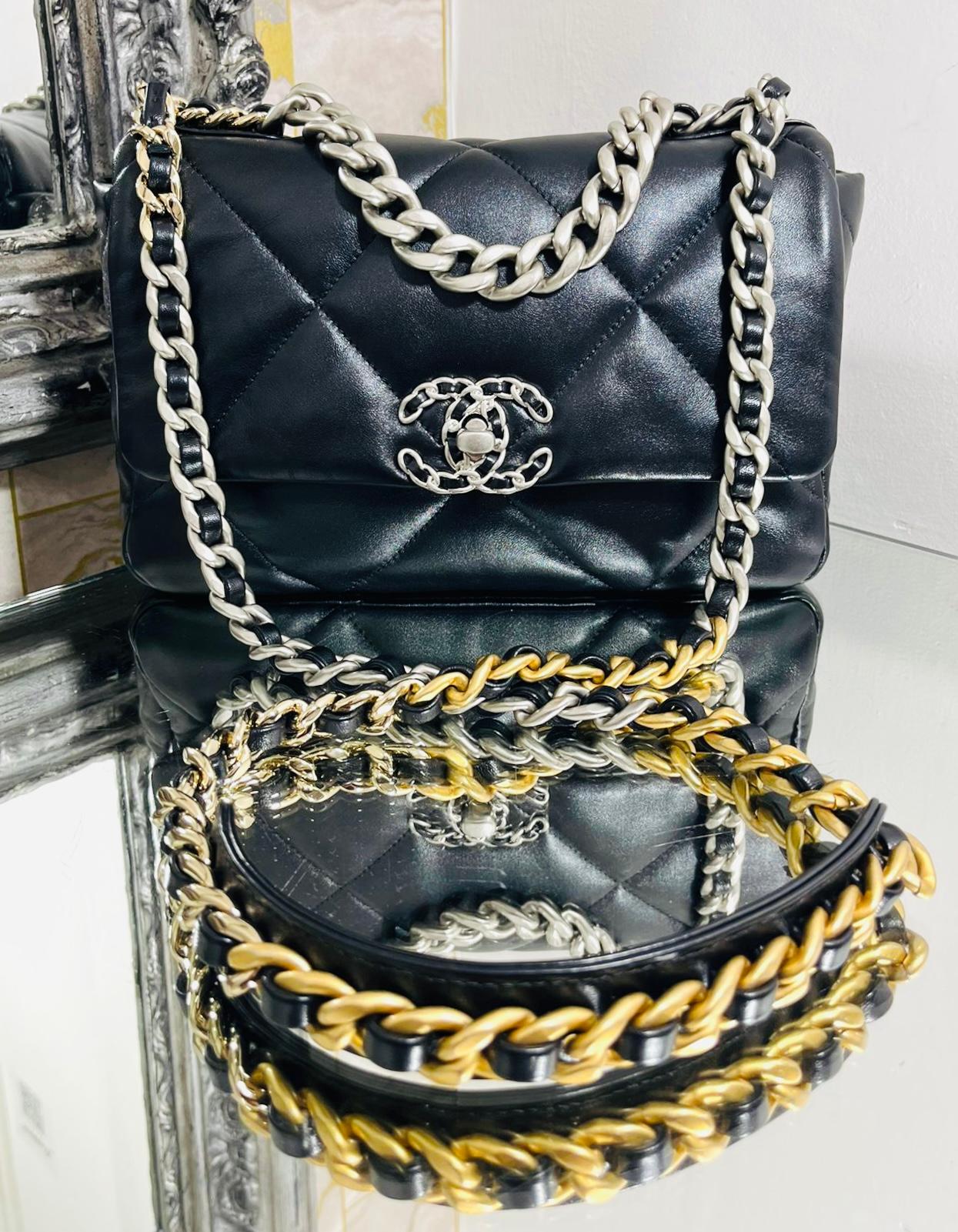 Chanel 19 Leather Flap Bag

Soft body, black bag designed with iconic diamond quilting.

Detailed with Chanel’s signature interlocking ‘CC’ turn-lock fastening with leather and chain link shoulder strap,

Featuring triple colour/ombre hardware, slip