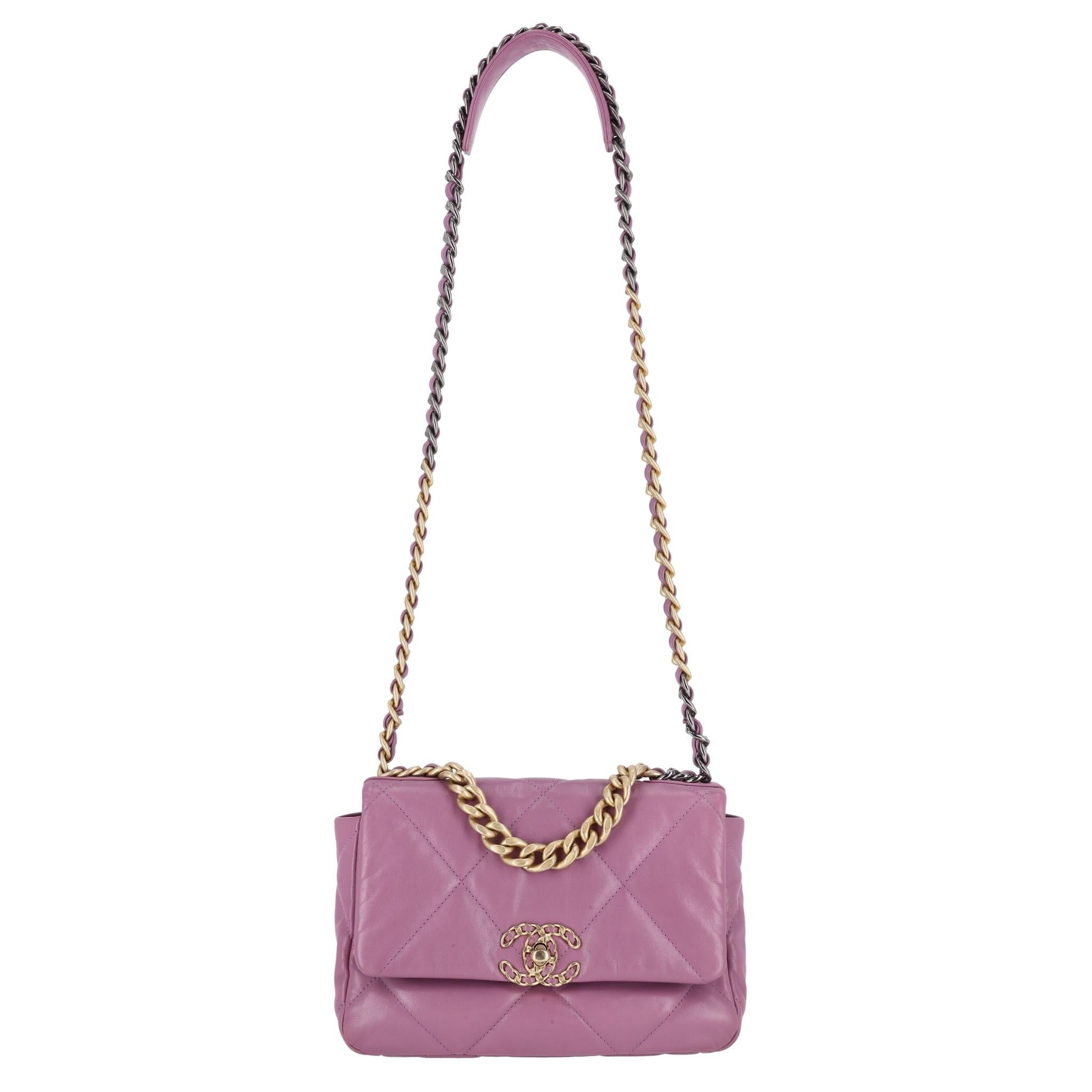 Chanel 19 Leather Flap Bag

Soft body, purple leather bag with diamond quilted shoulder bag.

Features Chanel’s signature interlocking ‘CC’ turn-lock fastening. Leather and chain link shoulder strap, triple colour hardware.

Slip pocket to the rear