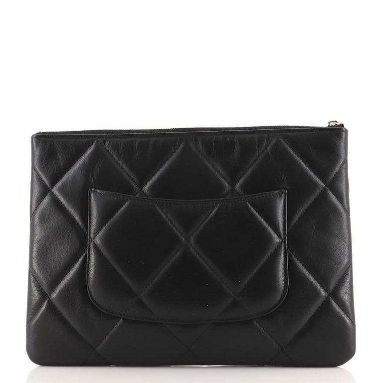 Preloved Chanel Black Quilted Lambskin O Case Clutch Bag 22969991 0413 –  KimmieBBags LLC