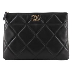 chanel quilted clutch bag