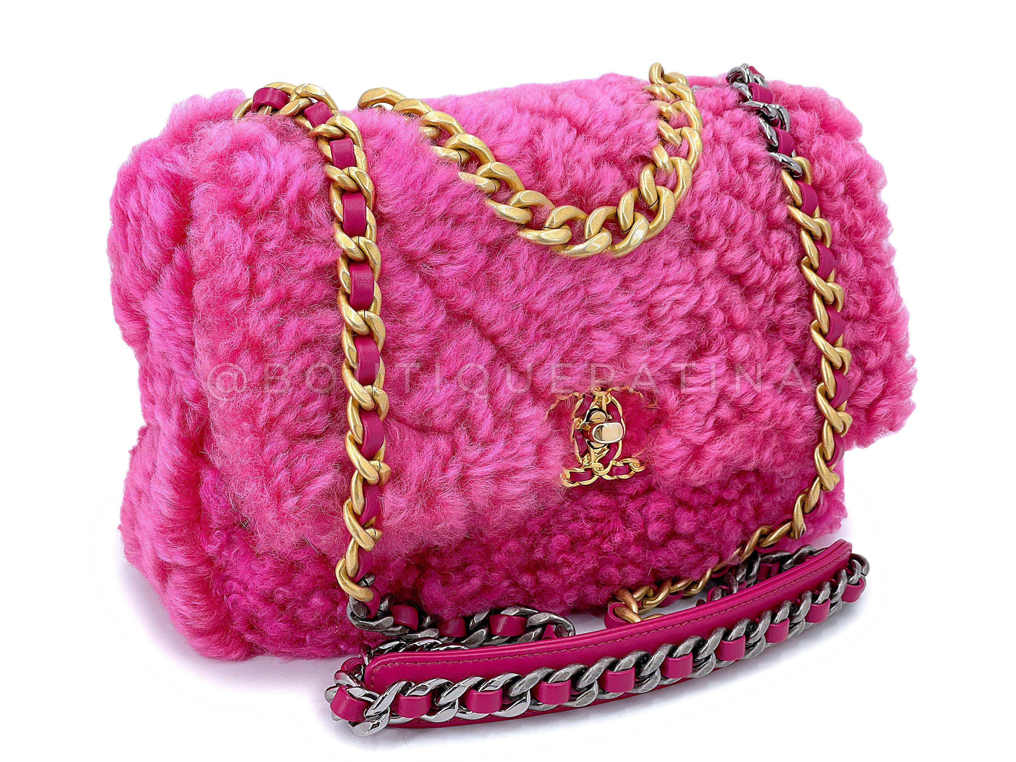 Store item: 67786
This Chanel 19 Pink Shearling Fur Small Medium Flap Bag is super whimsical and yummy with a fuchsia pink shearling fur that is cozy and chic at the same time. 

The Chanel 19 ligne is a relatively new timeless look released from