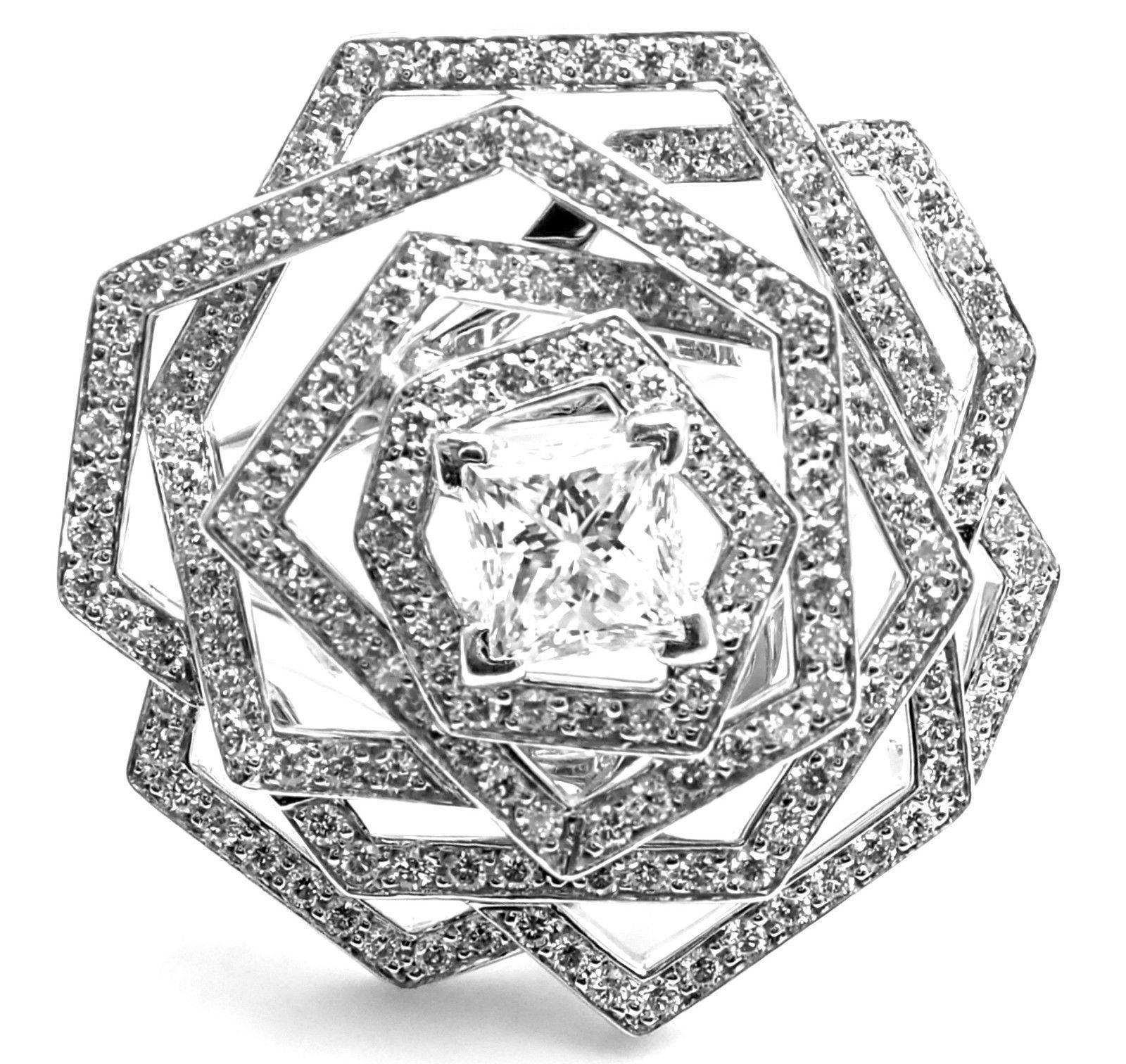 18k White Gold Diamond Flower Large 1932 Ring by Chanel. 
Part of Chanel's gorgeous 1932 collection. 
With 166 brilliant cut diamonds G color VS1 clarity.
1 princess but diamonds in the middle G color VS1 clarity approx. .65ct
Total weight:
