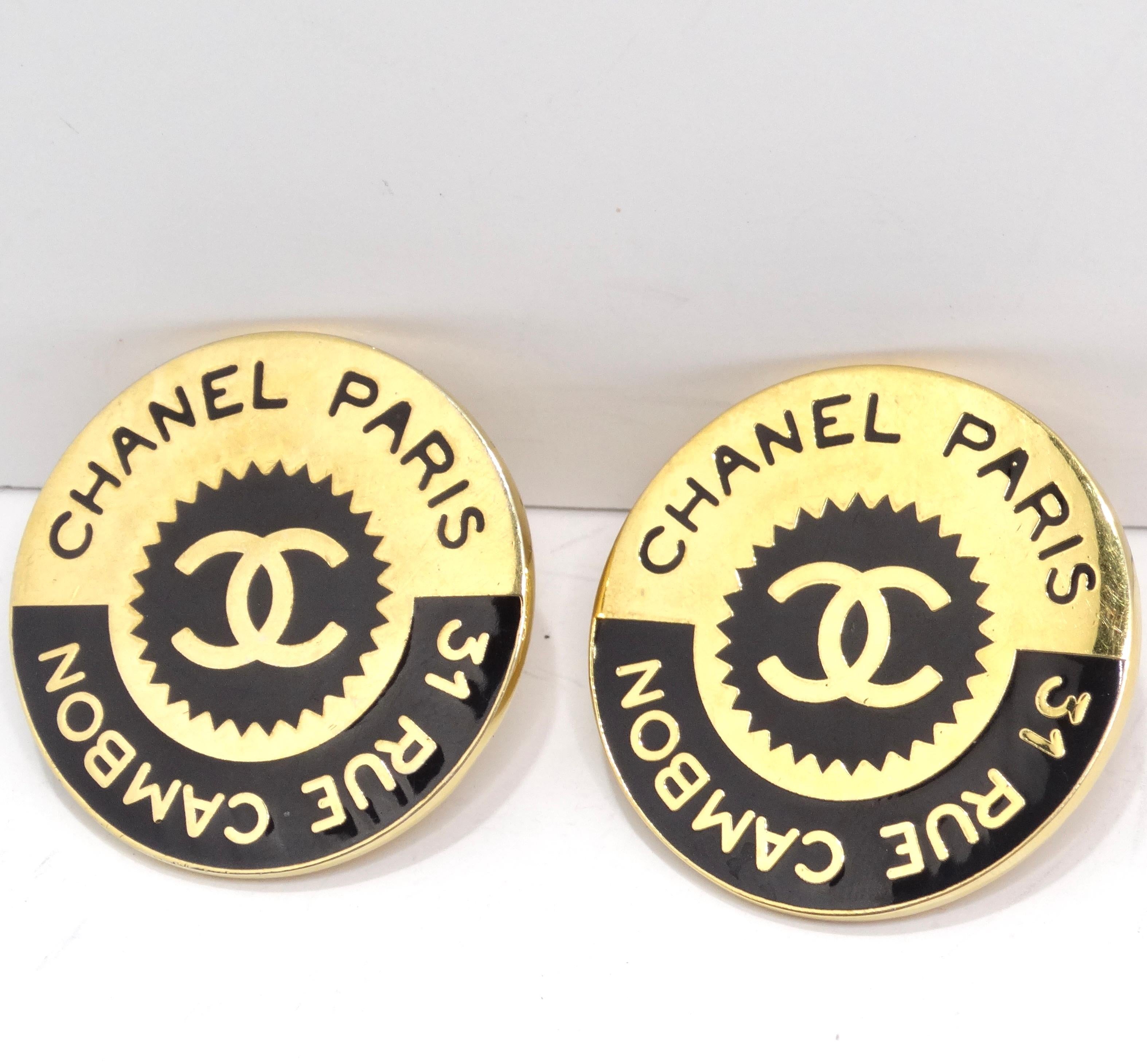 Elevate your style with the Chanel 1980s 31 Rue Cambon Logo Black Gold Plated Earrings – incredible disc-shaped statement earrings that pay homage to the brand's iconic legacy. These earrings feature yellow gold plating contrasted by black ' CHANEL