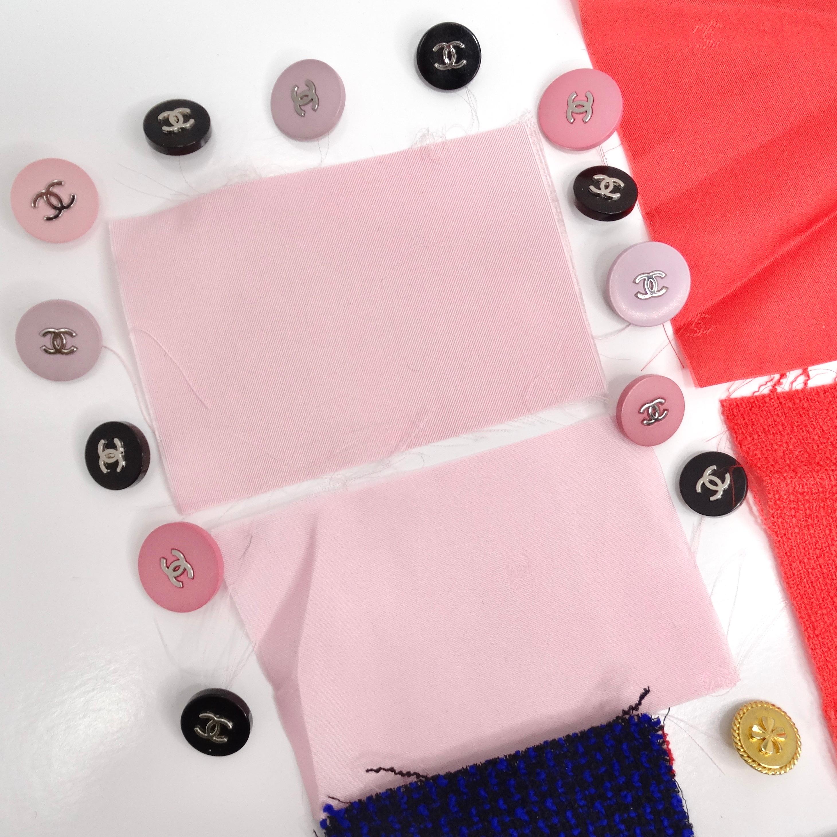 Introducing the exquisite Chanel 1980s and 90s Set of 21 Buttons, a must-have collection for Chanel enthusiasts and collectors alike. This set includes 21 iconic Chanel buttons, along with 6 fabric scraps, providing the perfect materials for