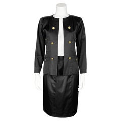 Chanel 1980's - Tailleur jupe en coton poli noir avec boutons de bouteille de parfum