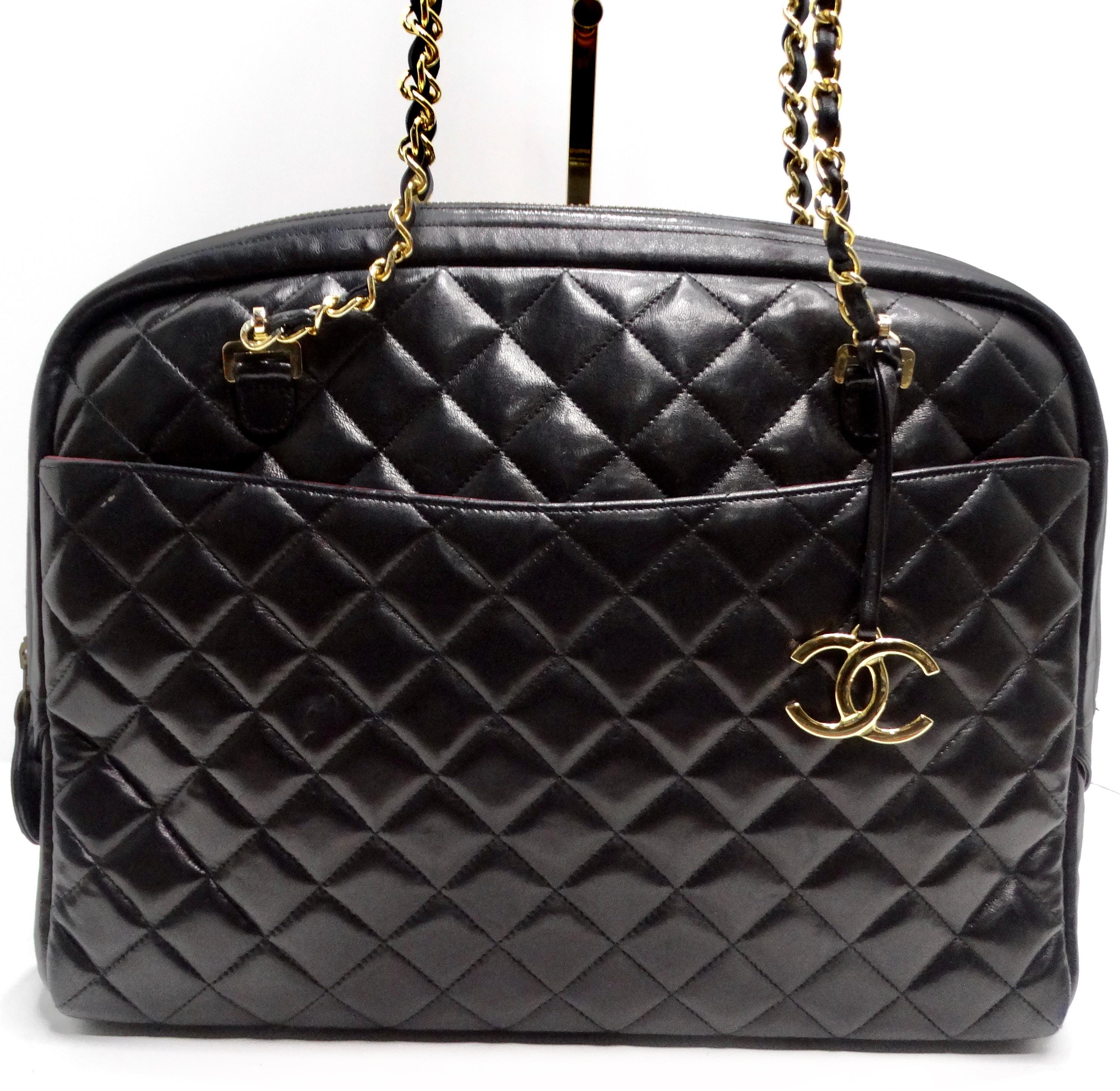 Introducing the Chanel 1980s Black Quilted Lambskin Camera Bag—a timeless and versatile piece that beautifully captures the essence of Chanel's iconic style. This camera bag is not just an accessory; it's a classic example of sophistication and