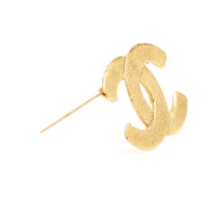 Chanel 1980 Broche CC métal doré Early CC Brooch