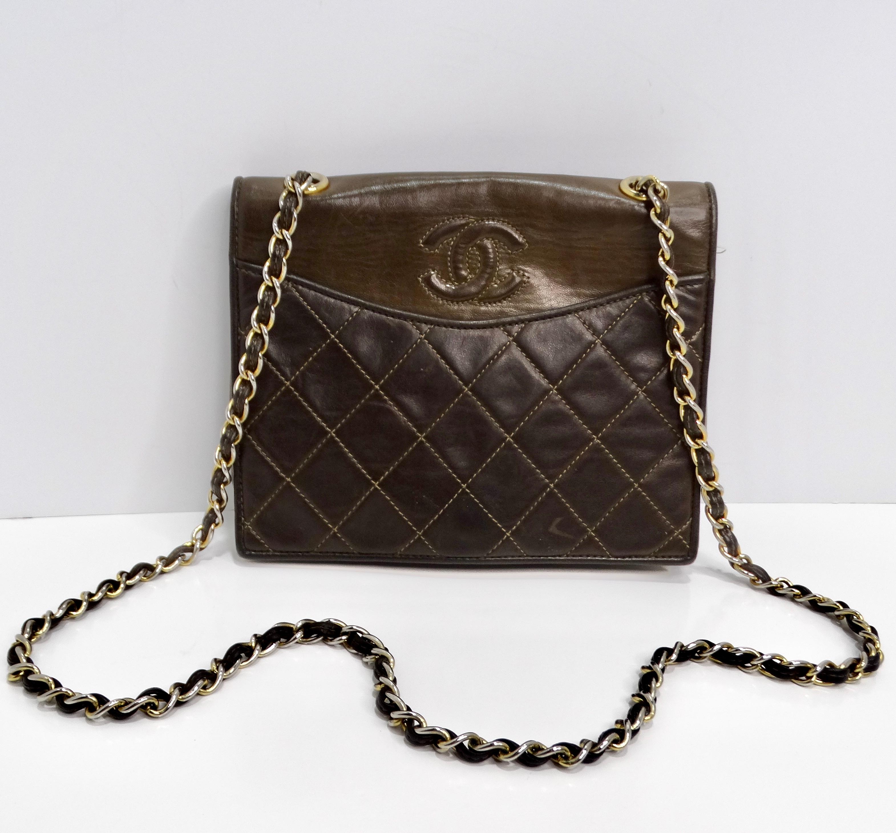 The Chanel 1980s Brown Lambskin Crossbody Bag is indeed a classic and versatile accessory. With its quilted fold-over flap adorned with the iconic CC logo, it exudes elegance and sophistication. The combination of brown lambskin leather and