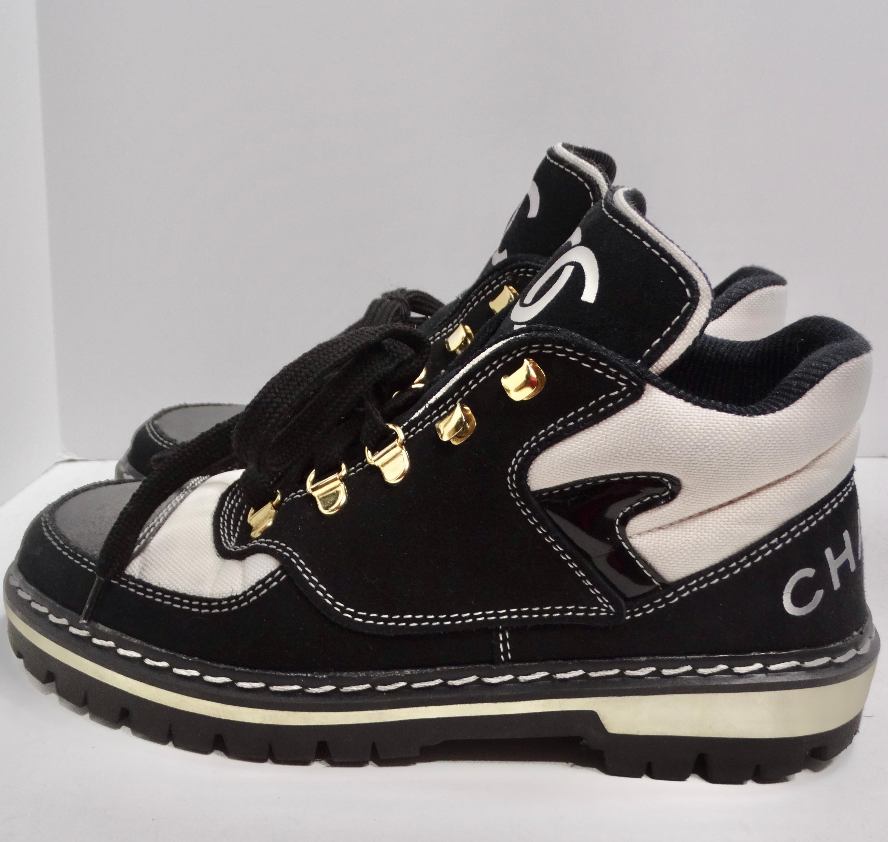 Do not miss out on the Chanel 1980s CC Lace-Up Black & White Sneakers—a remarkable pair that seamlessly blends the classic comfort of sneakers with an elevated Chanel twist. These sneakers aren't just footwear; they're a wearable expression of