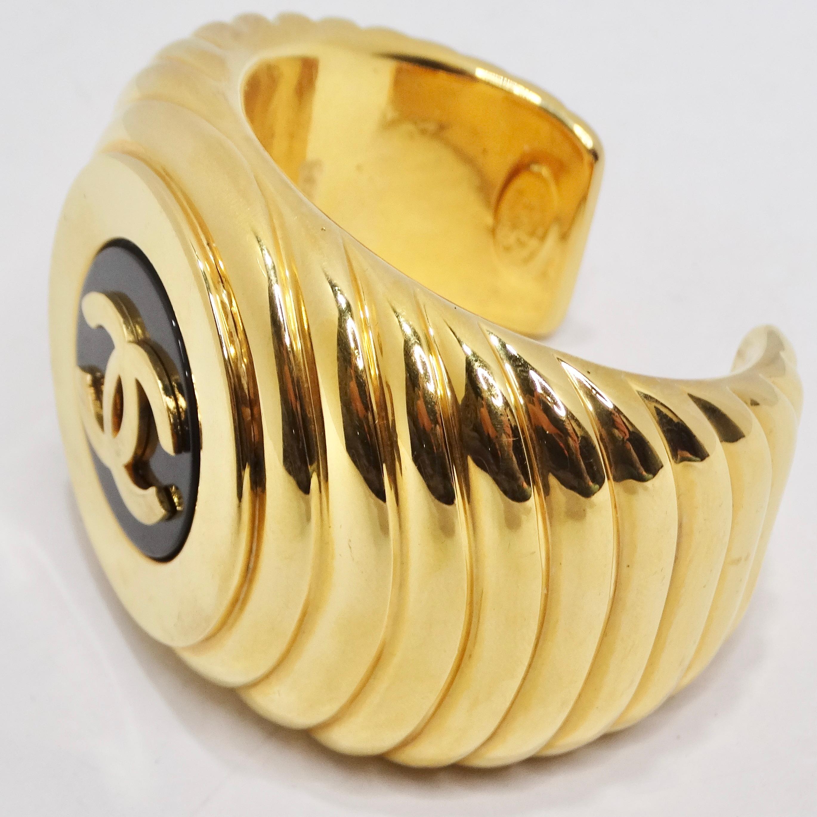 Chanel 1980s CC Logo Ribbed Gold Tone Cuff Bracelet For Sale 1