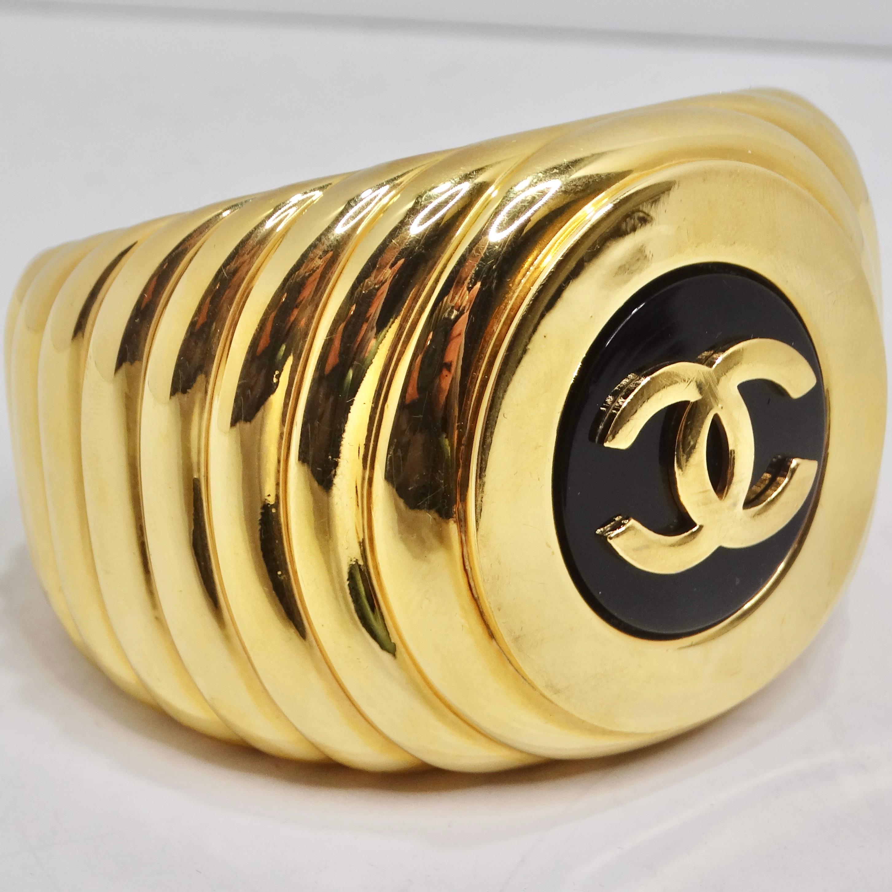 Chanel 1980s CC Logo Ribbed Gold Tone Cuff Bracelet For Sale 2