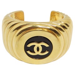 Retro Chanel 1980s CC Logo Ribbed Gold Tone Cuff Bracelet