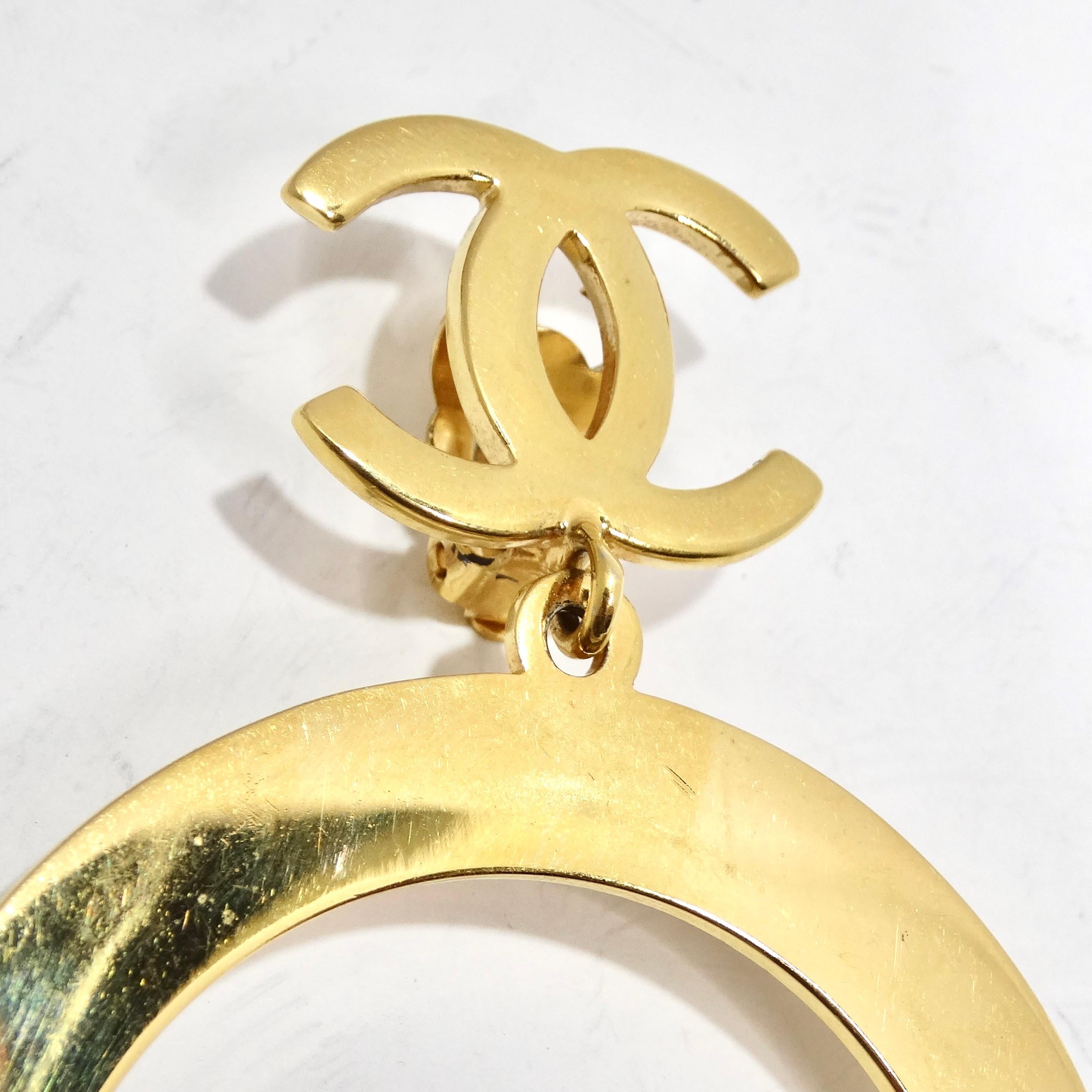 Women's or Men's Chanel 1980s Gold Tone Logo Jumbo Hoop Earrings For Sale