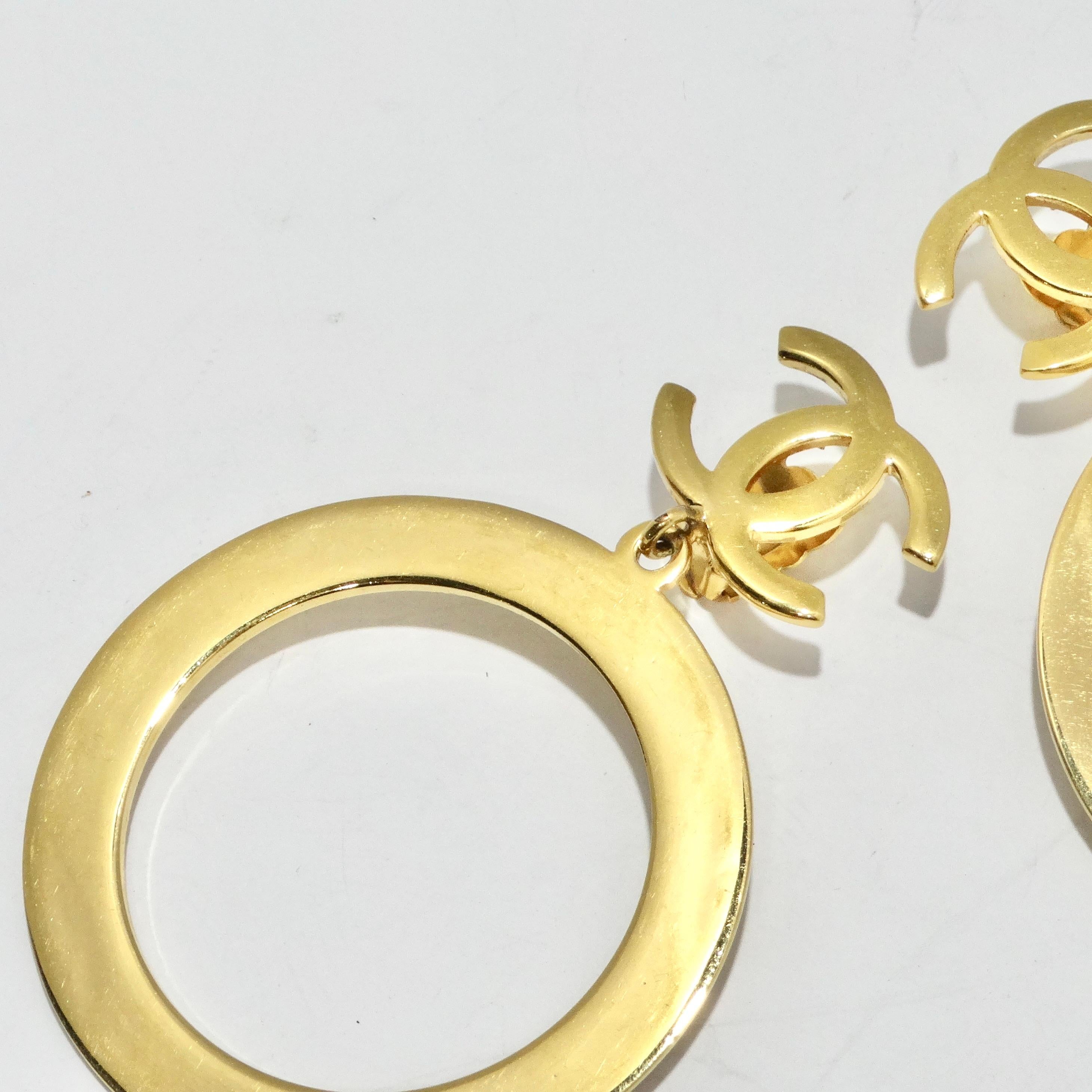Chanel 1980s Gold Tone Logo Jumbo Hoop Earrings For Sale 1