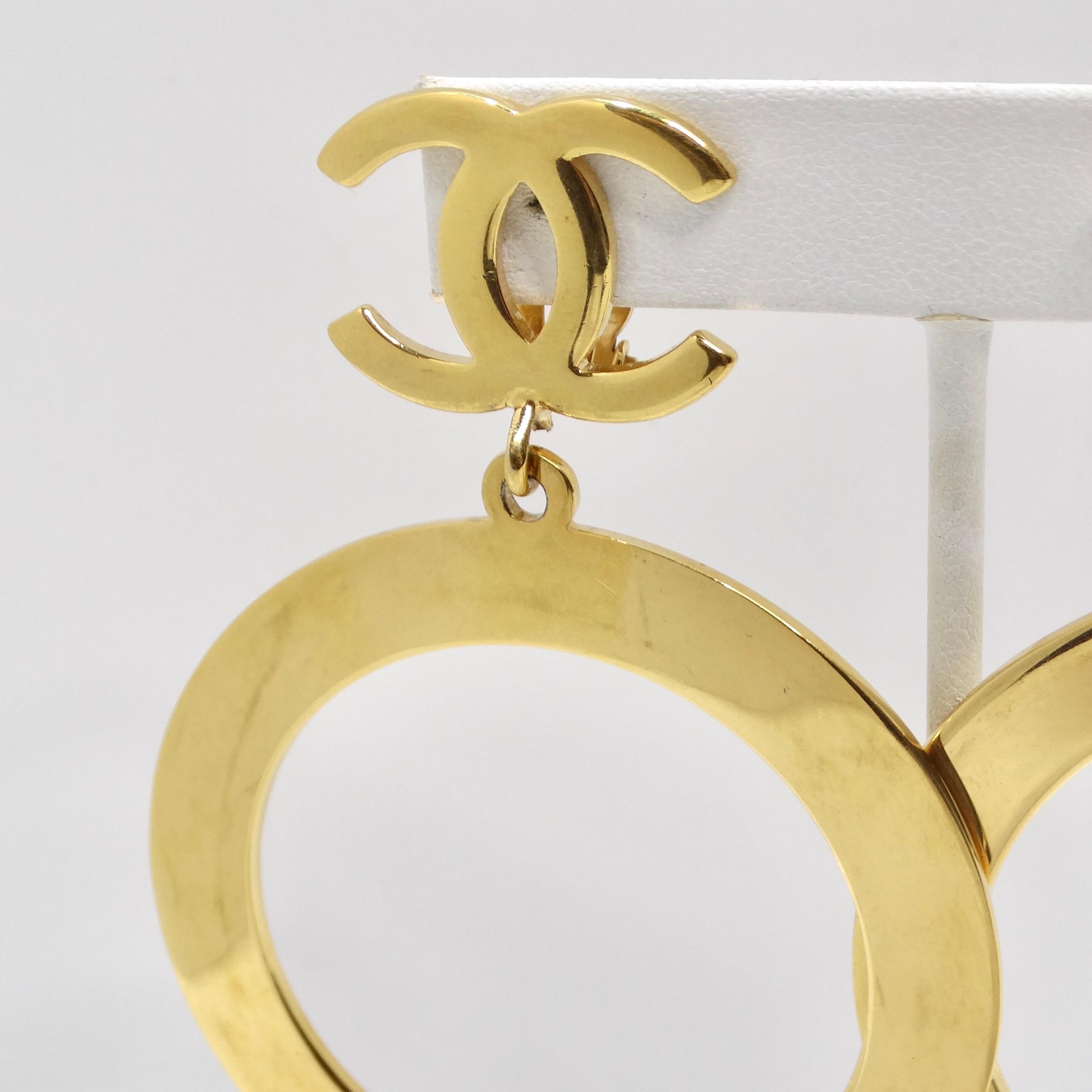 Chanel 1980s Gold Tone Logo Jumbo Hoop Earrings For Sale 2