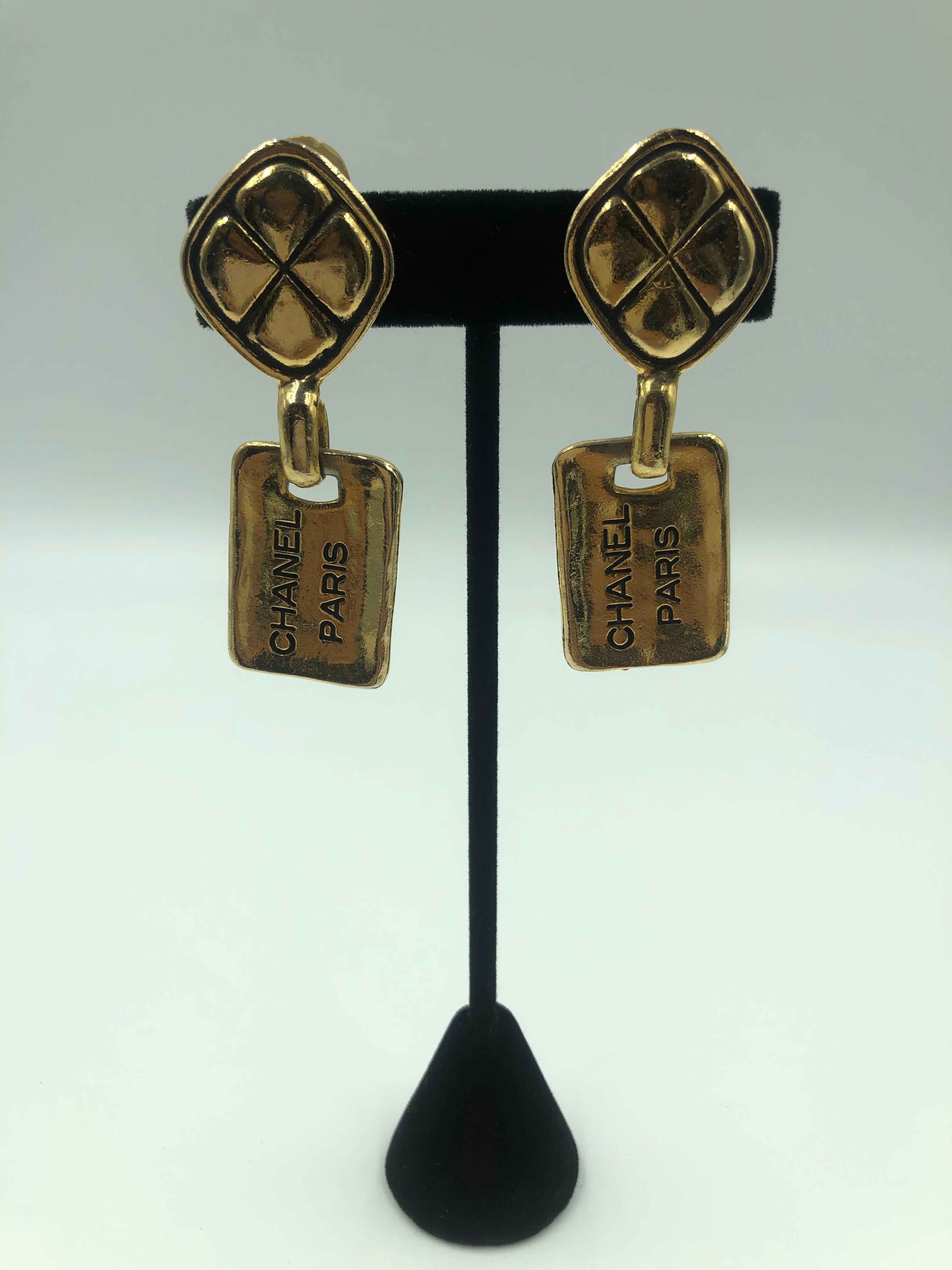 1980's Chanel Paris Stamped Gold Tone Drop Earrings

Length: 2.5