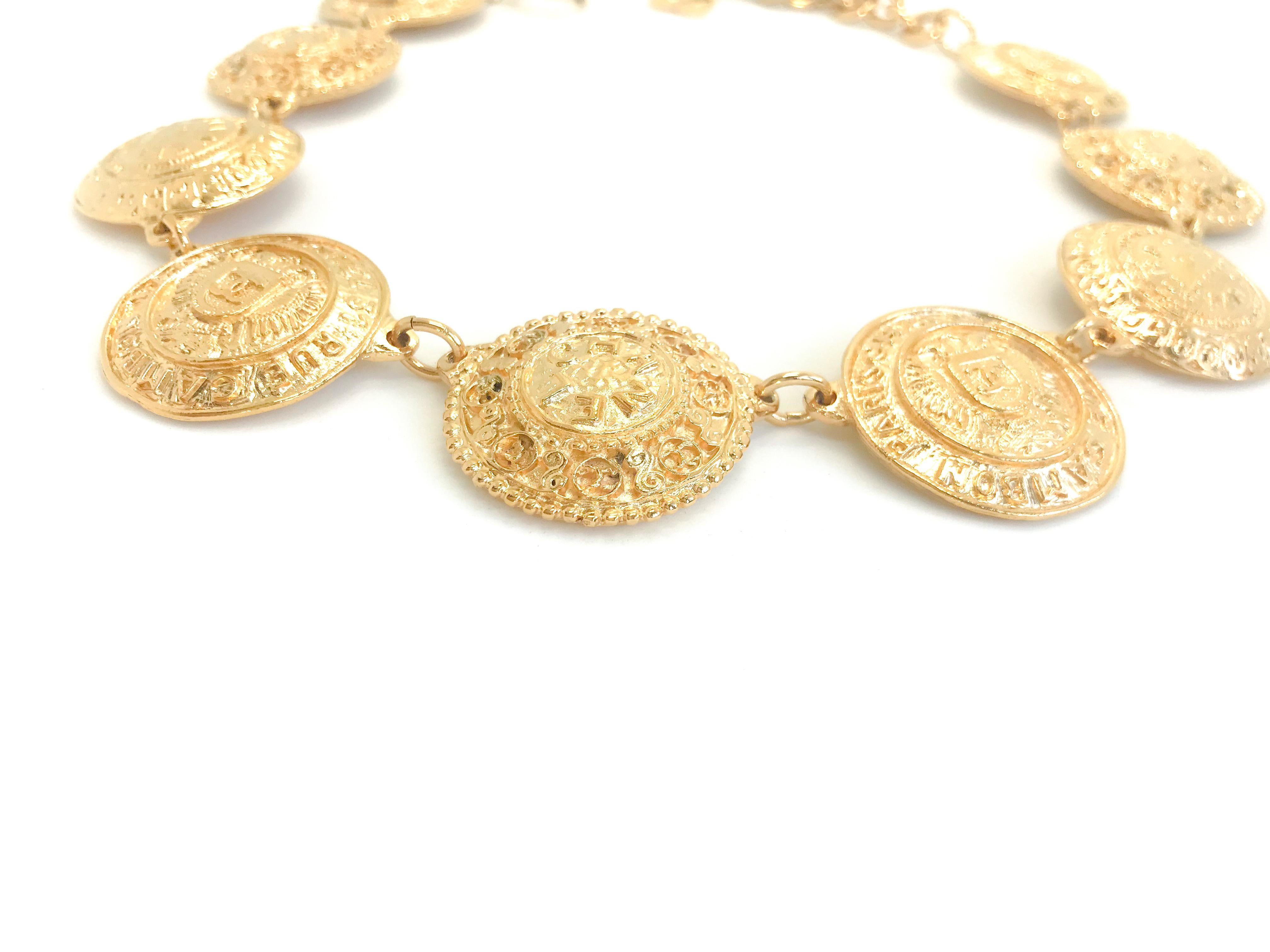 Chanel 1980s Vintage Medallion Necklace

CHANEL 31 Rue Cambon Paris CC Medallion Gold Plated Necklace.

This stunning necklace is collar length with antique Chanel medallions. Classic 80s chanel collectors item from the Victoire de Castellane