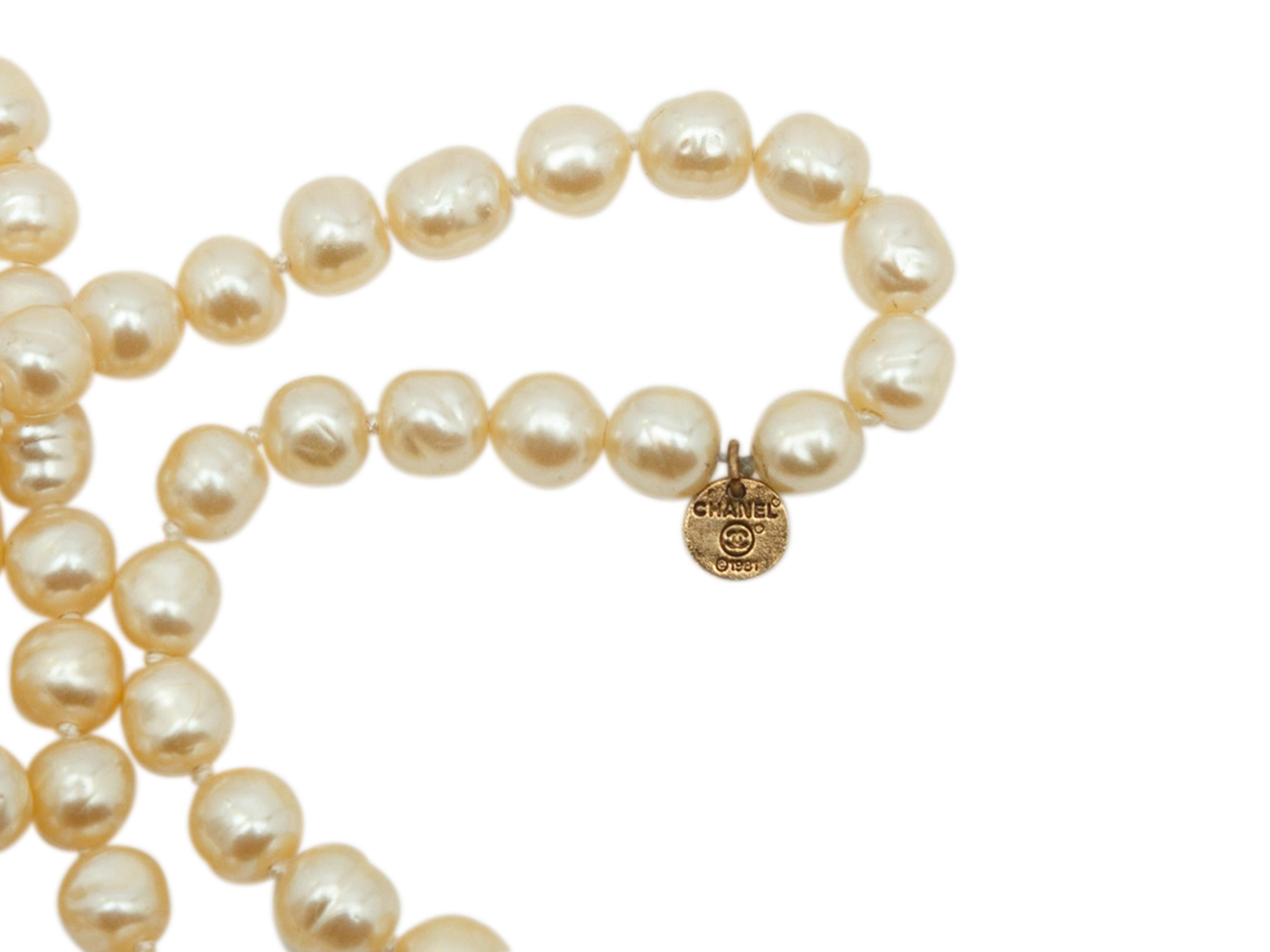 Product details: Vintage 1981 pearl necklace by Chanel. No clasp. 30