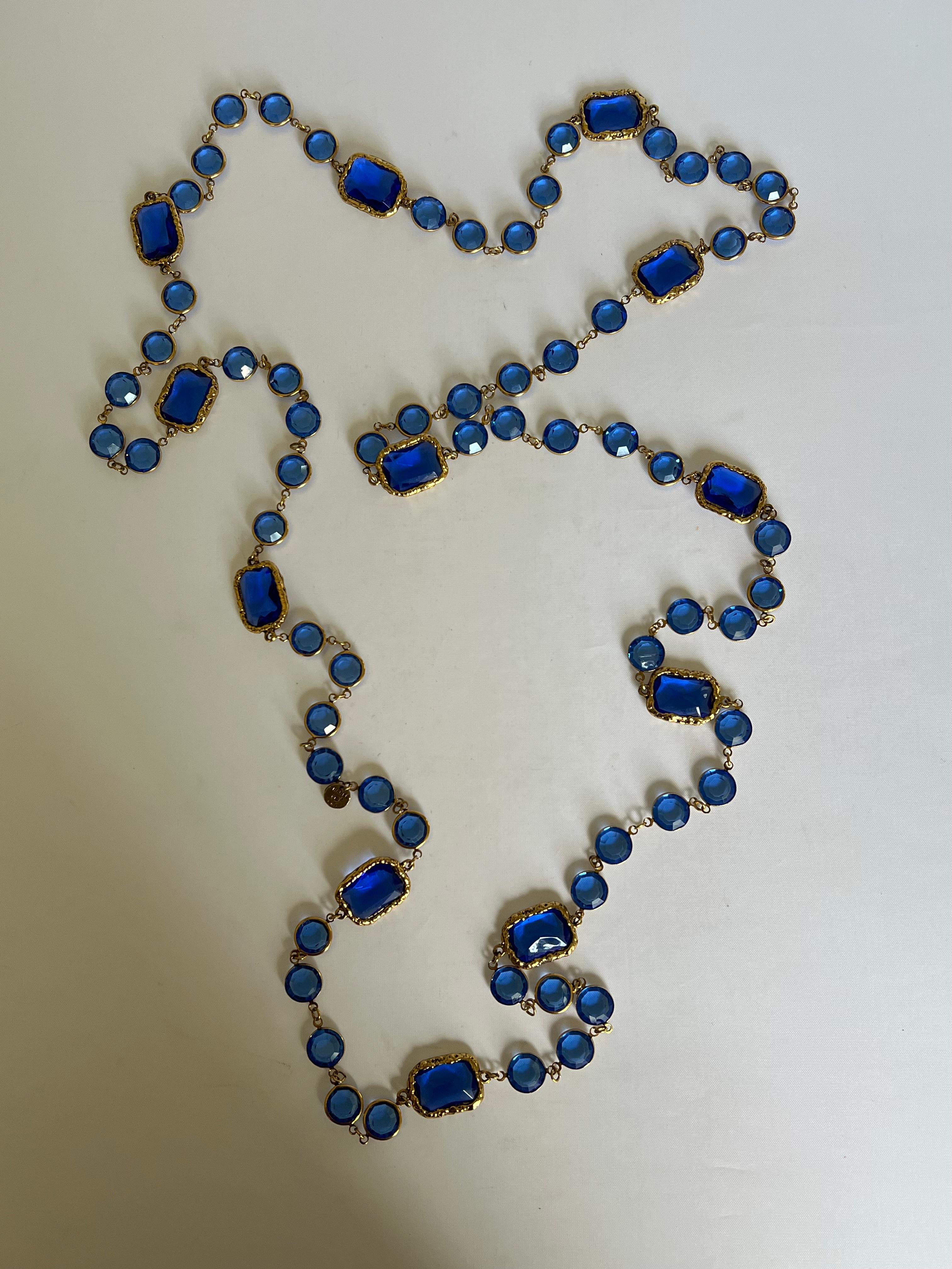 Chanel 1981 vintage chicklet blue crystal Chicklet sautoir station strand necklace. It is stamped Chanel 1981. 63 inches, the longer length - can be worn single, double or triple.
